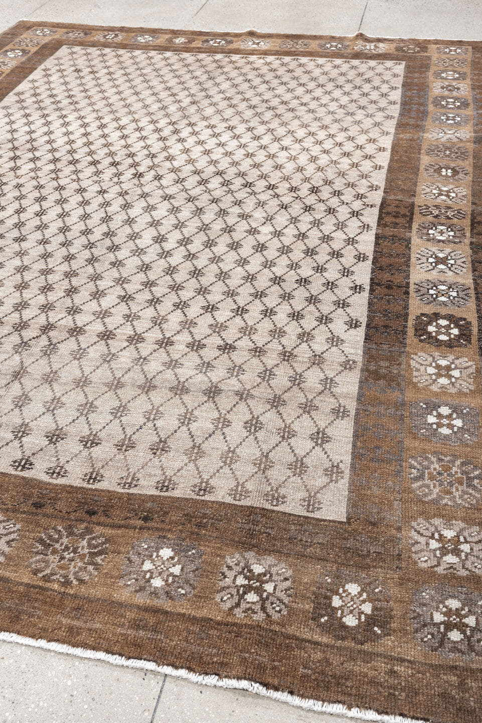 8' x 10' one-of-a-kind handmade antique Kars large size rug. Color palette: ivory, taupe, brown, camel, charcoal, beige