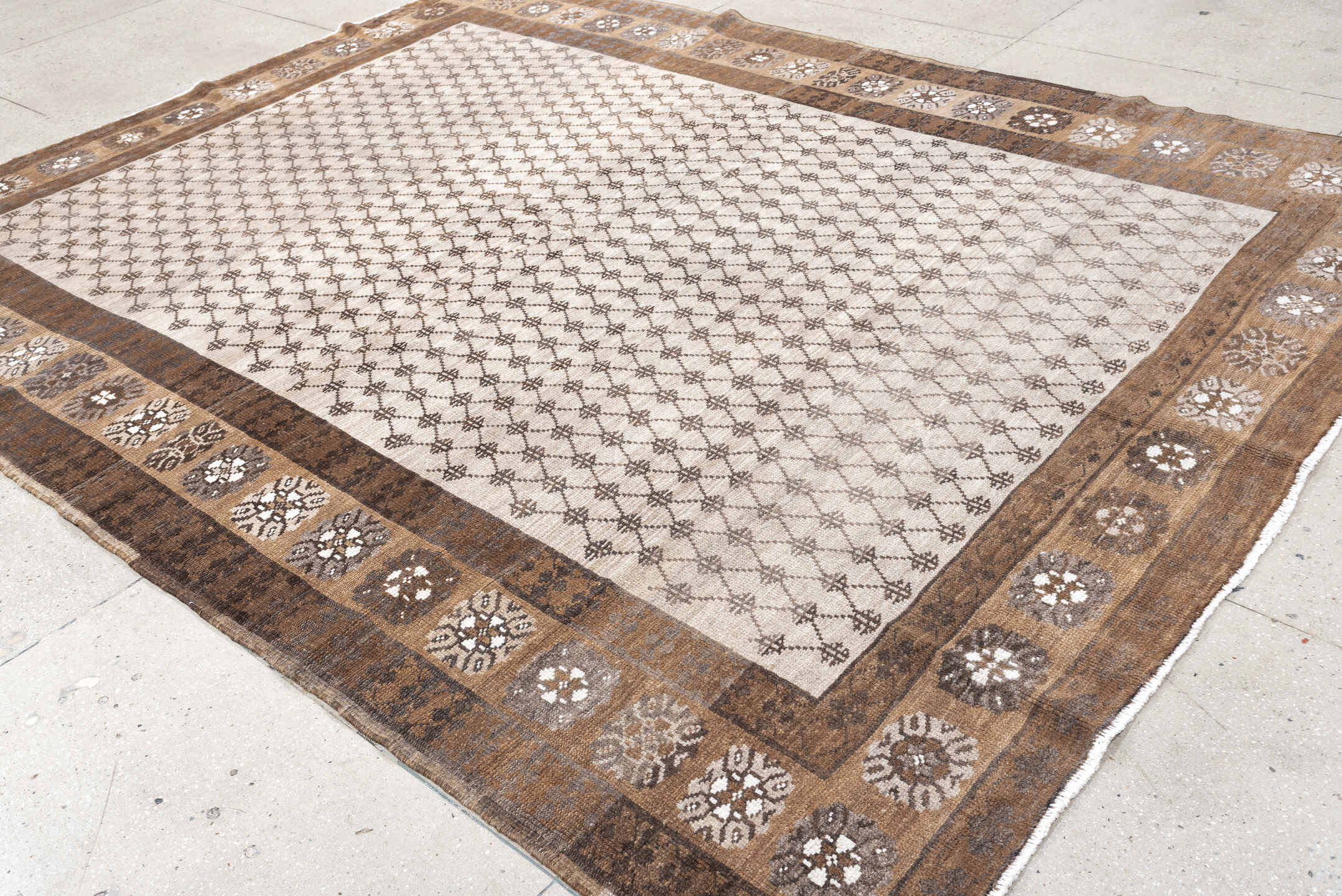 8' x 10' one-of-a-kind handmade antique Kars large size rug. Color palette: ivory, taupe, brown, camel, charcoal, beige