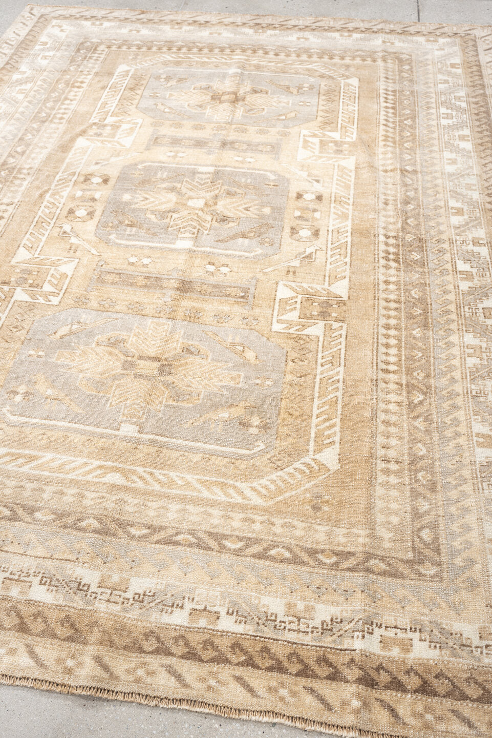 5' x 8' one-of-a-kind handmade antique Kars medium size rug. Color palette: ivory, camel, taupe, light gray, beige, sand