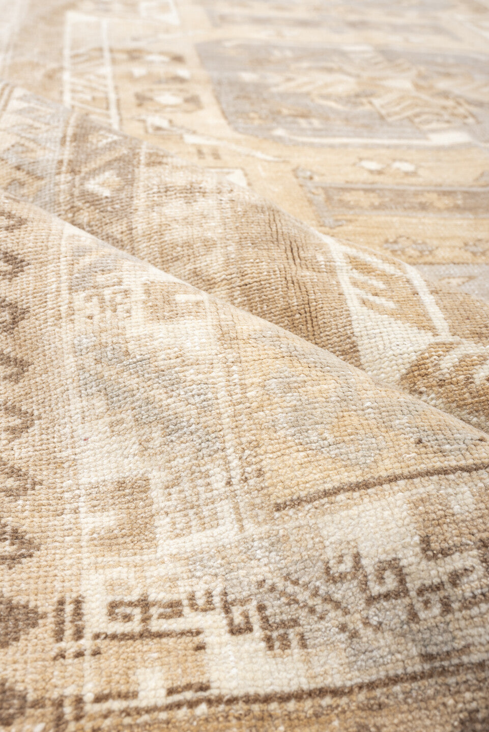 5' x 8' one-of-a-kind handmade antique Kars medium size rug. Color palette: ivory, camel, taupe, light gray, beige, sand