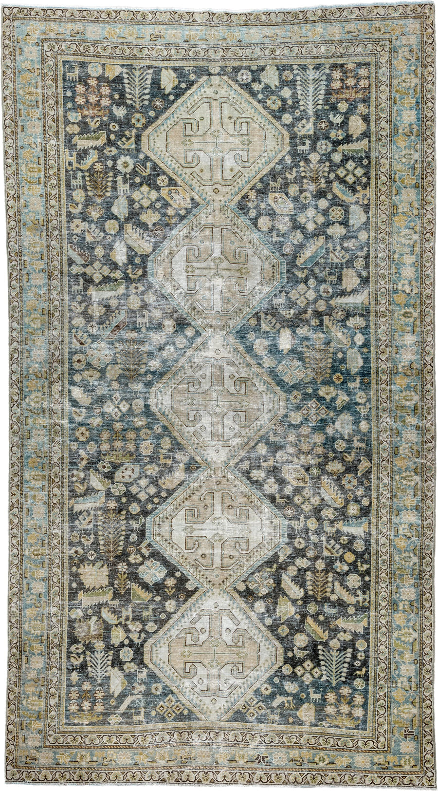 5' x 9' one-of-a-kind handmade antique Qashqai medium size rug. Color palette: charcoal, ivory, sky blue, taupe, beige