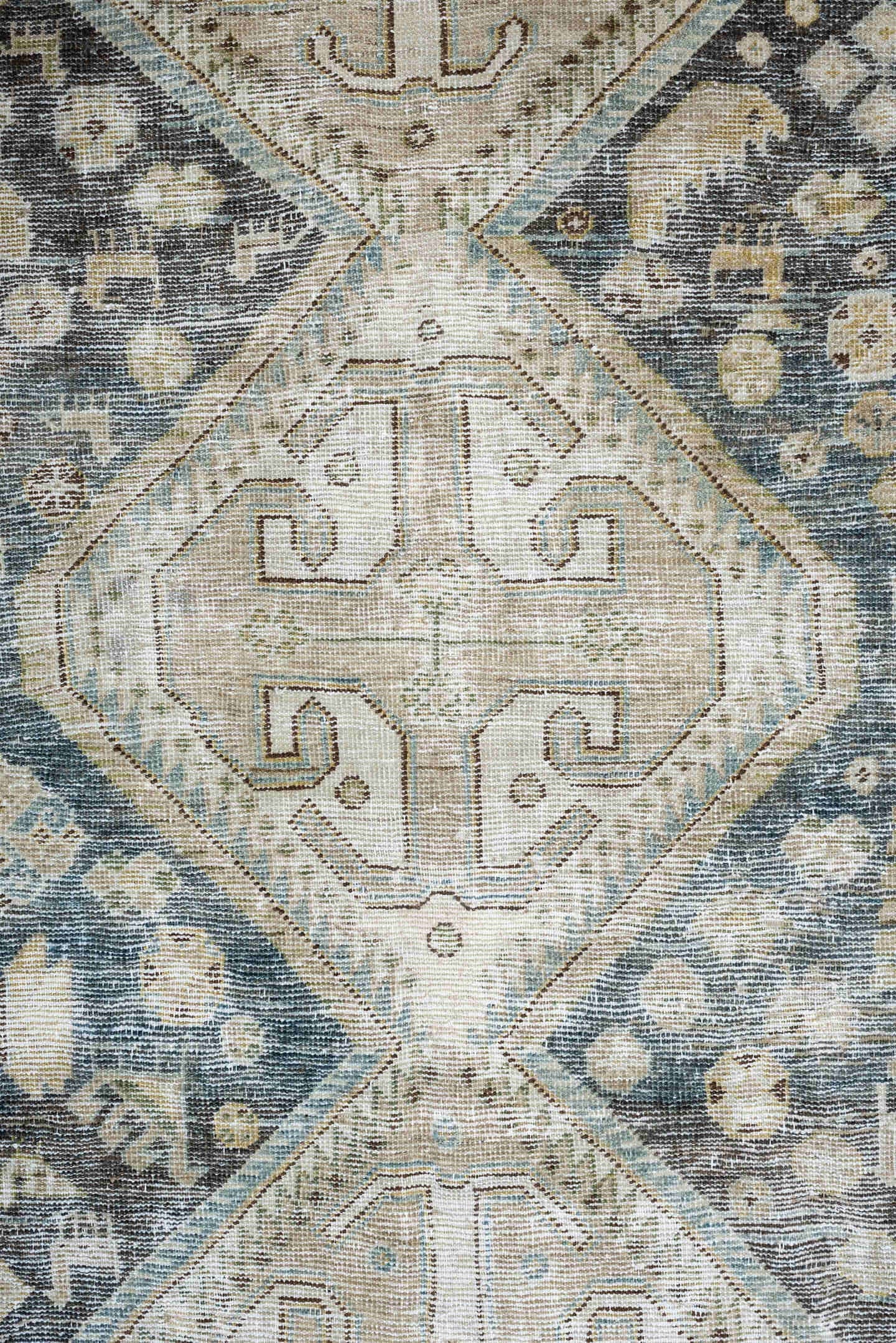 5' x 9' one-of-a-kind handmade antique Qashqai medium size rug. Color palette: charcoal, ivory, sky blue, taupe, beige