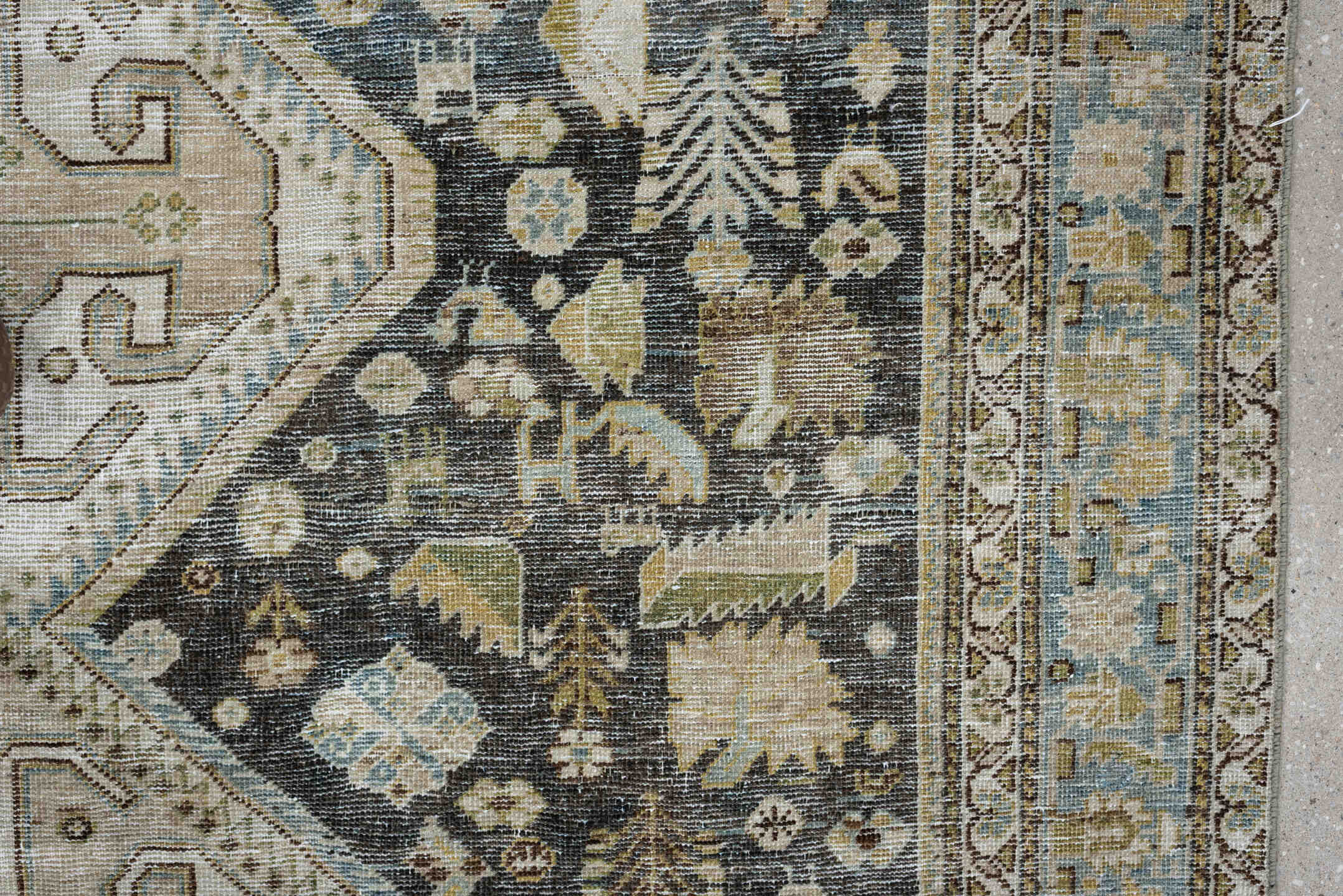 5' x 9' one-of-a-kind handmade antique Qashqai medium size rug. Color palette: charcoal, ivory, sky blue, taupe, beige