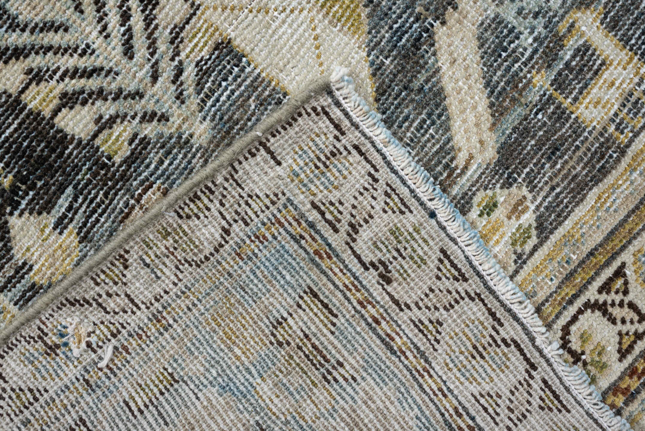 5' x 9' one-of-a-kind handmade antique Qashqai medium size rug. Color palette: charcoal, ivory, sky blue, taupe, beige