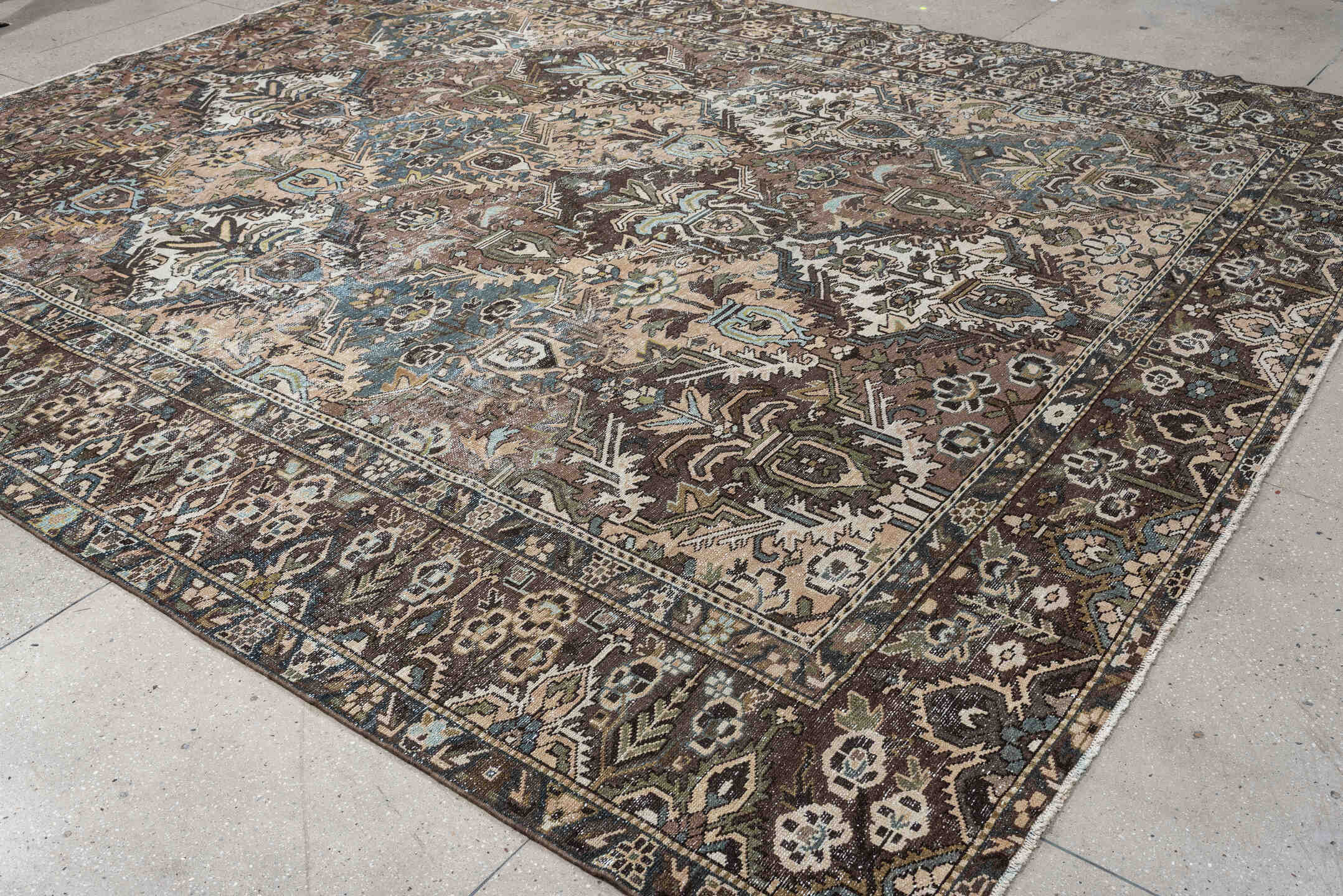10' x 13' one-of-a-kind handmade antique Baktiary oversize rug. Color palette: brown, taupe, sky blue, ivory, sage, charcoal