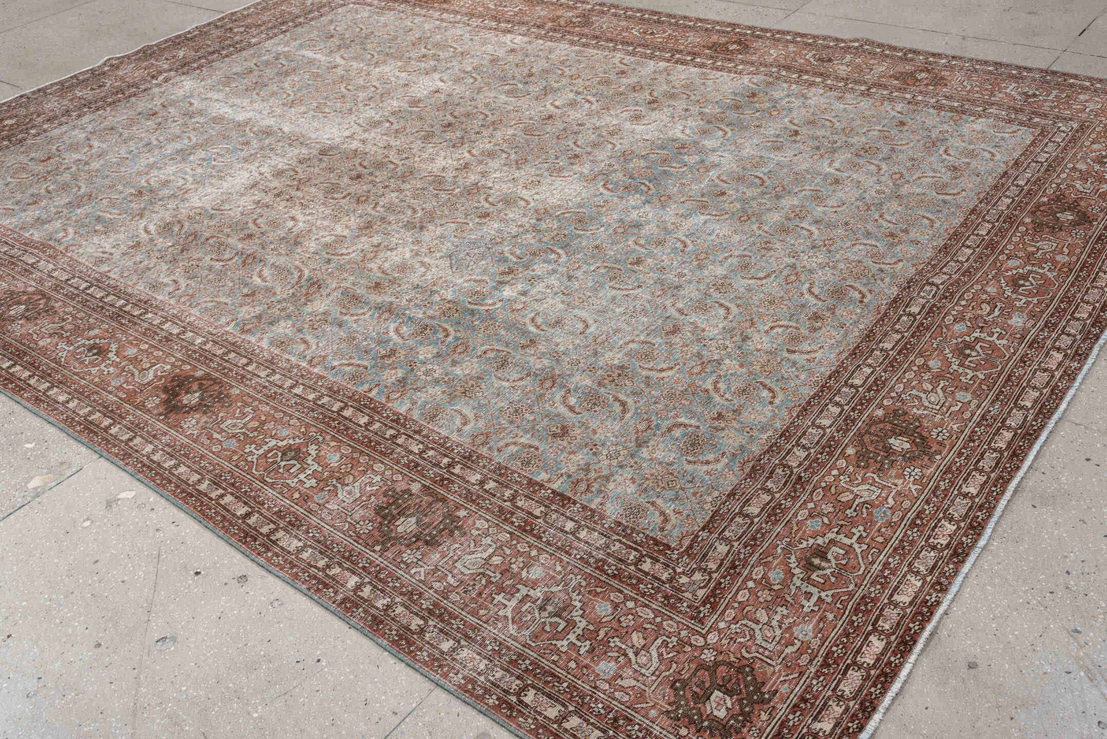 9' x 11' one-of-a-kind handmade antique Tabriz large size rug. Color palette: terracotta, pale blue, ivory, taupe, brown