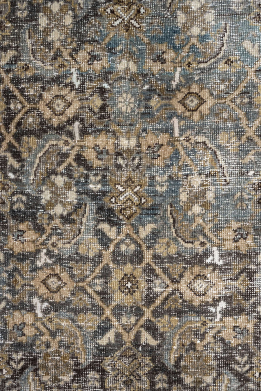 5' x 9' one-of-a-kind handmade antique Shiraz medium size rug. Color palette: taupe, brown, blue, ivory, charcoal, camel