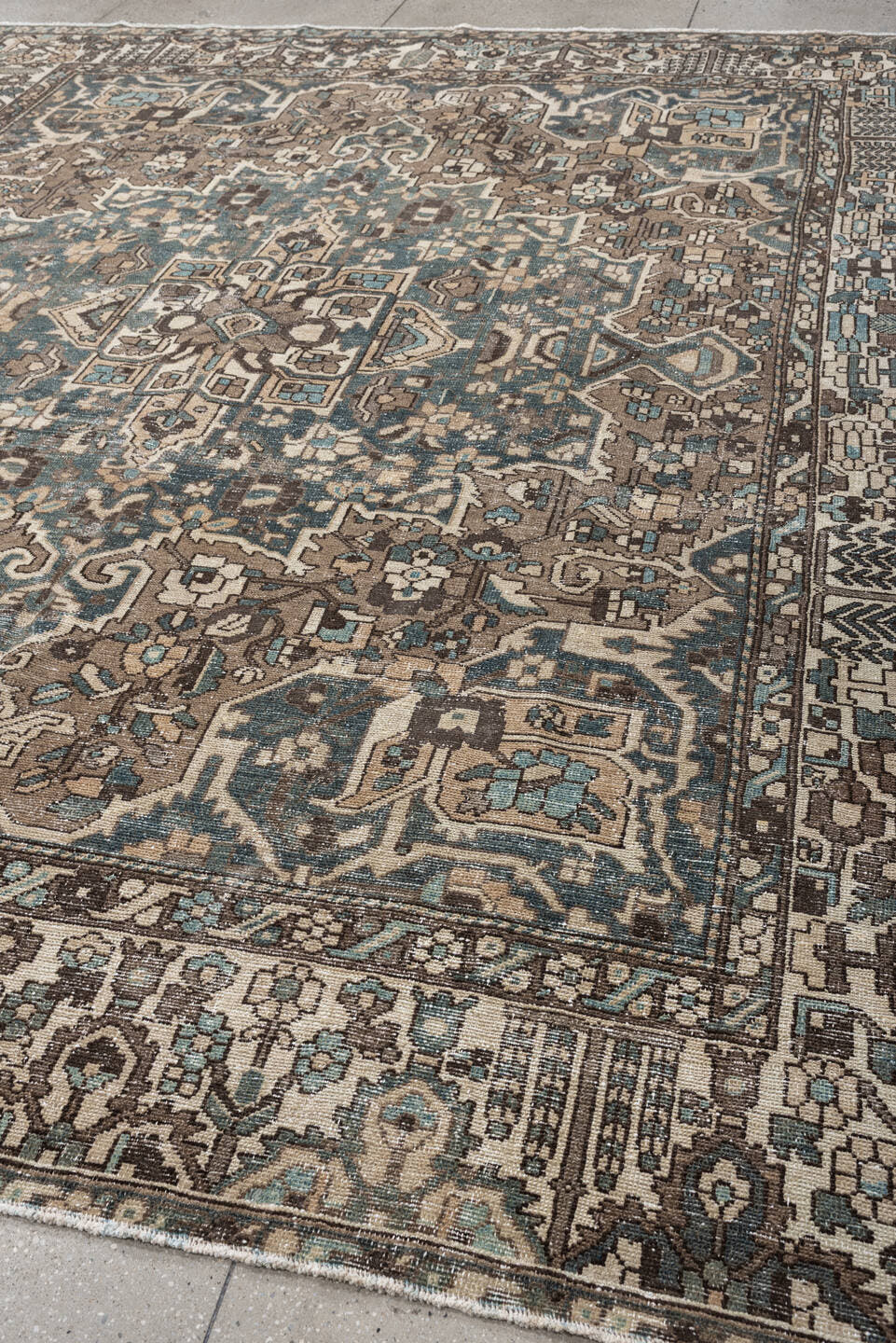 10' x 11' one-of-a-kind handmade antique Baktiary large size rug. Color palette: taupe, ivory, teal, charcoal, slate, camel