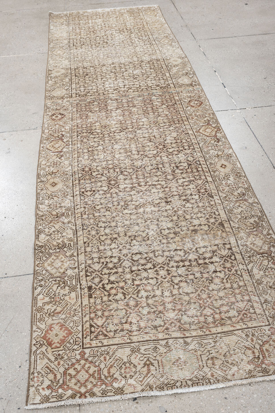 3' x 10' one-of-a-kind handmade antique Malayer runner rug. Color palette: ivory, taupe, camel, brown, soft rust, beige