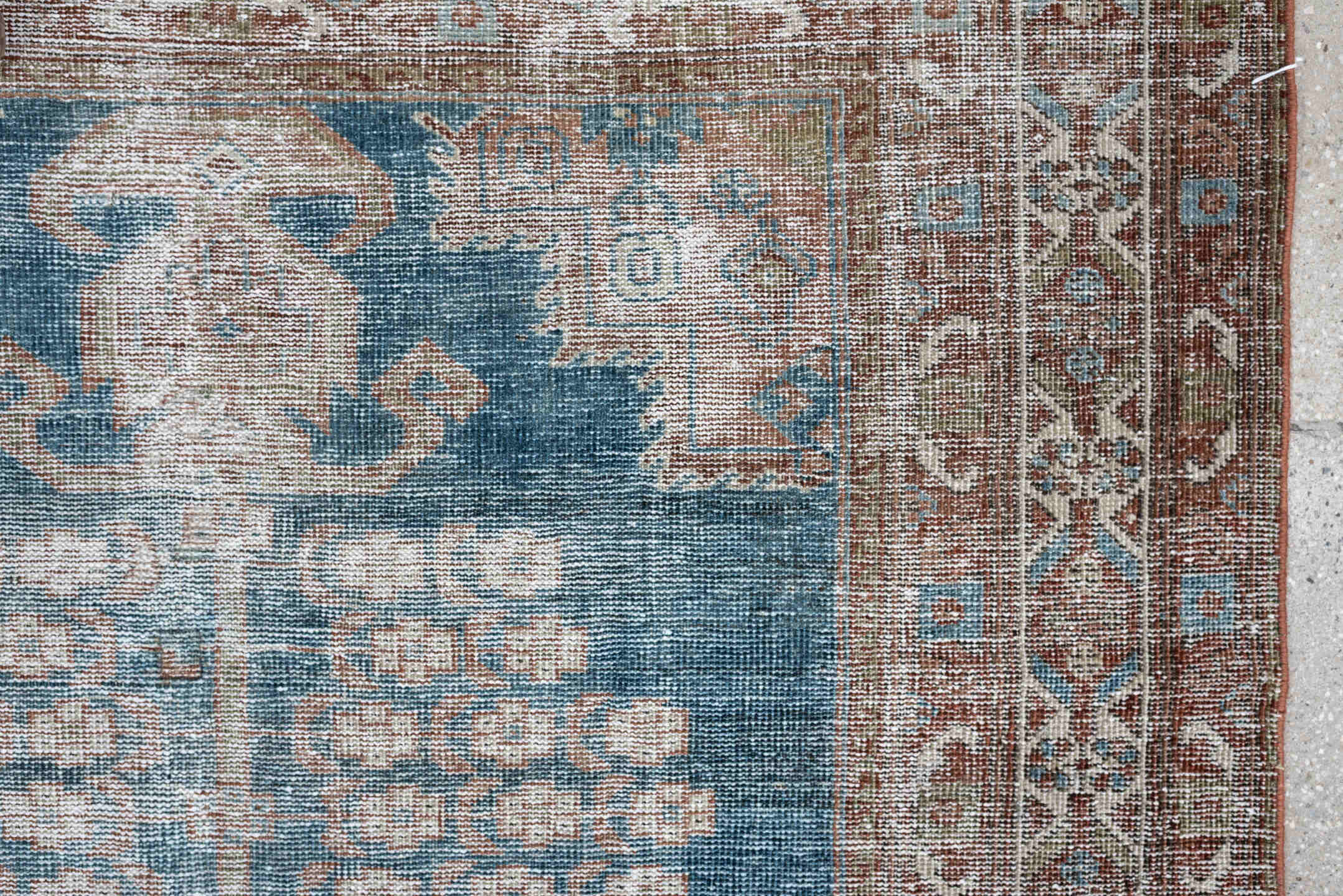 4' x 5' one-of-a-kind handmade antique Shiraz small size rug. Color palette: blue, rust, ivory, taupe, camel, terracotta
