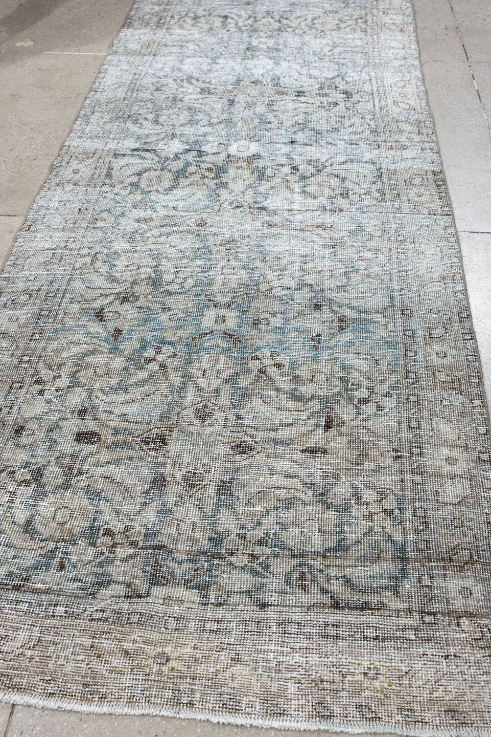 3' x 9' one-of-a-kind handmade antique Mahal runner rug. Color palette: ivory, taupe, pale blue, gray, brown, beige