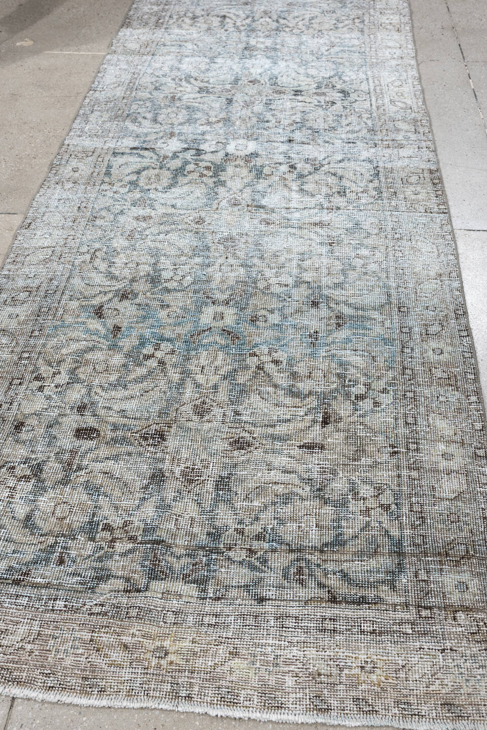 3' x 9' one-of-a-kind handmade antique Mahal runner rug. Color palette: ivory, taupe, pale blue, gray, brown, beige