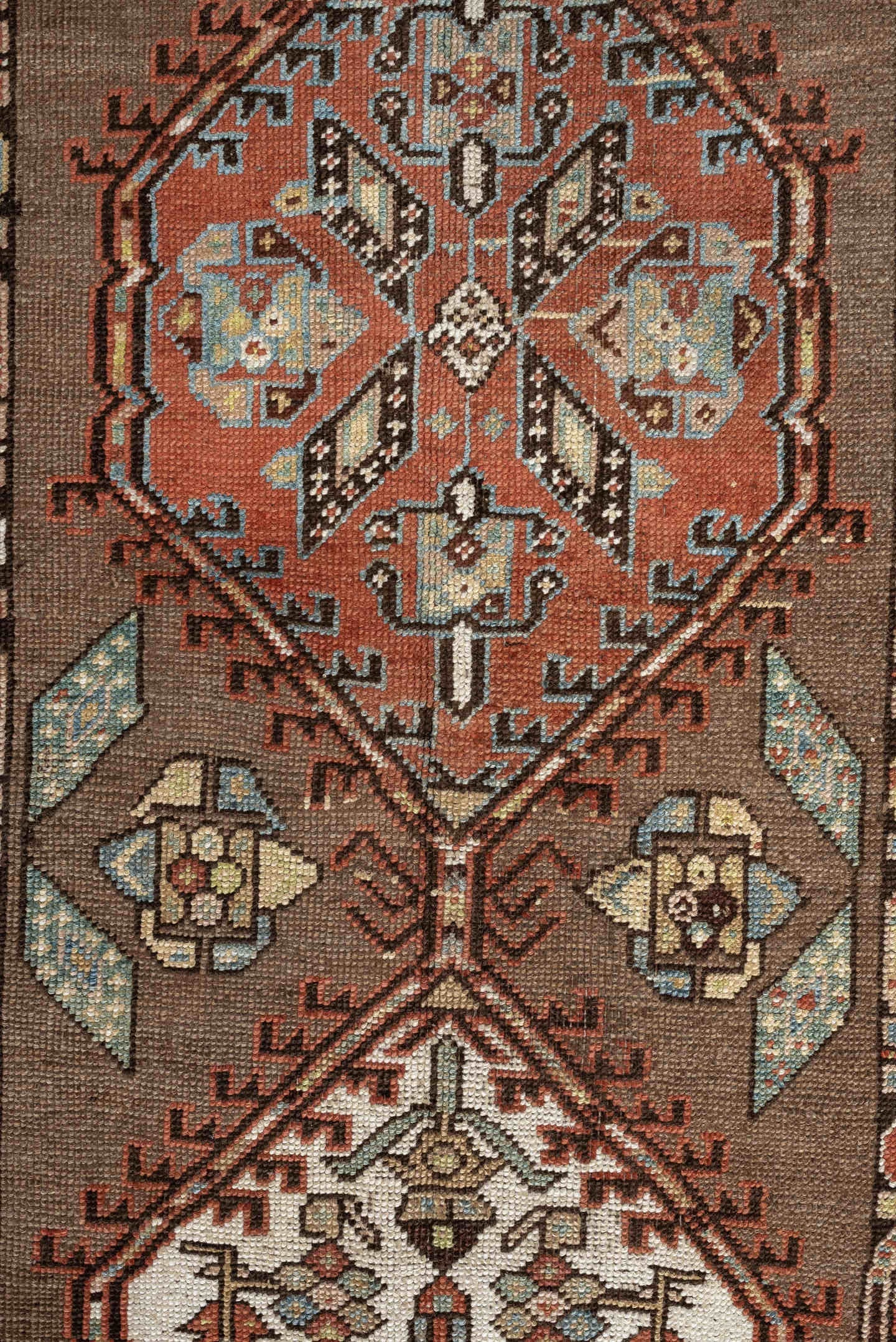 3' x 11' one-of-a-kind handmade antique Sarab runner rug. Color palette: brown, ivory, rust, sky blue, camel, terra cotta