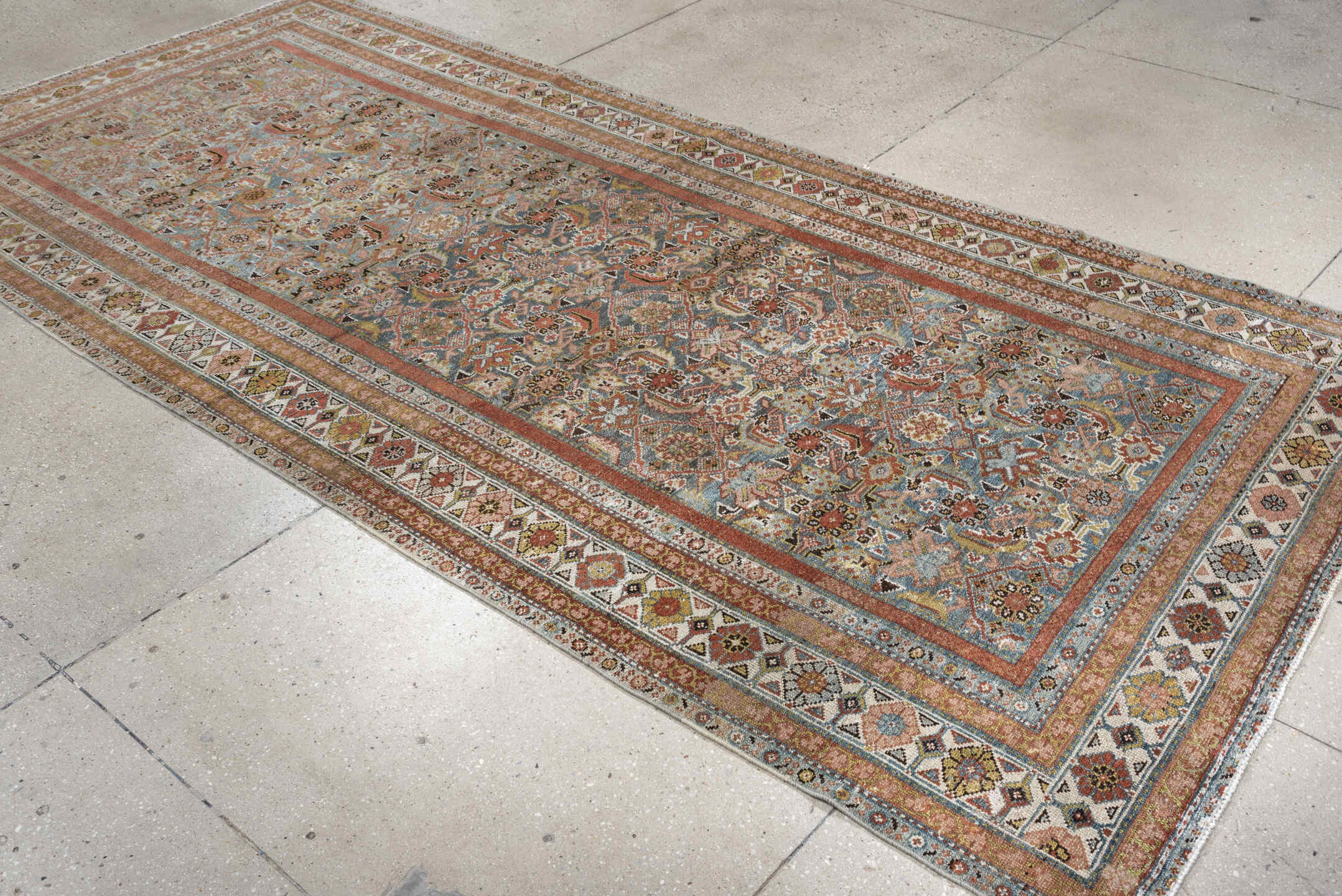 4' x 10' one-of-a-kind handmade antique Malayer runner rug. Color palette: blue, rust, ivory, taupe, sage, camel, charcoal