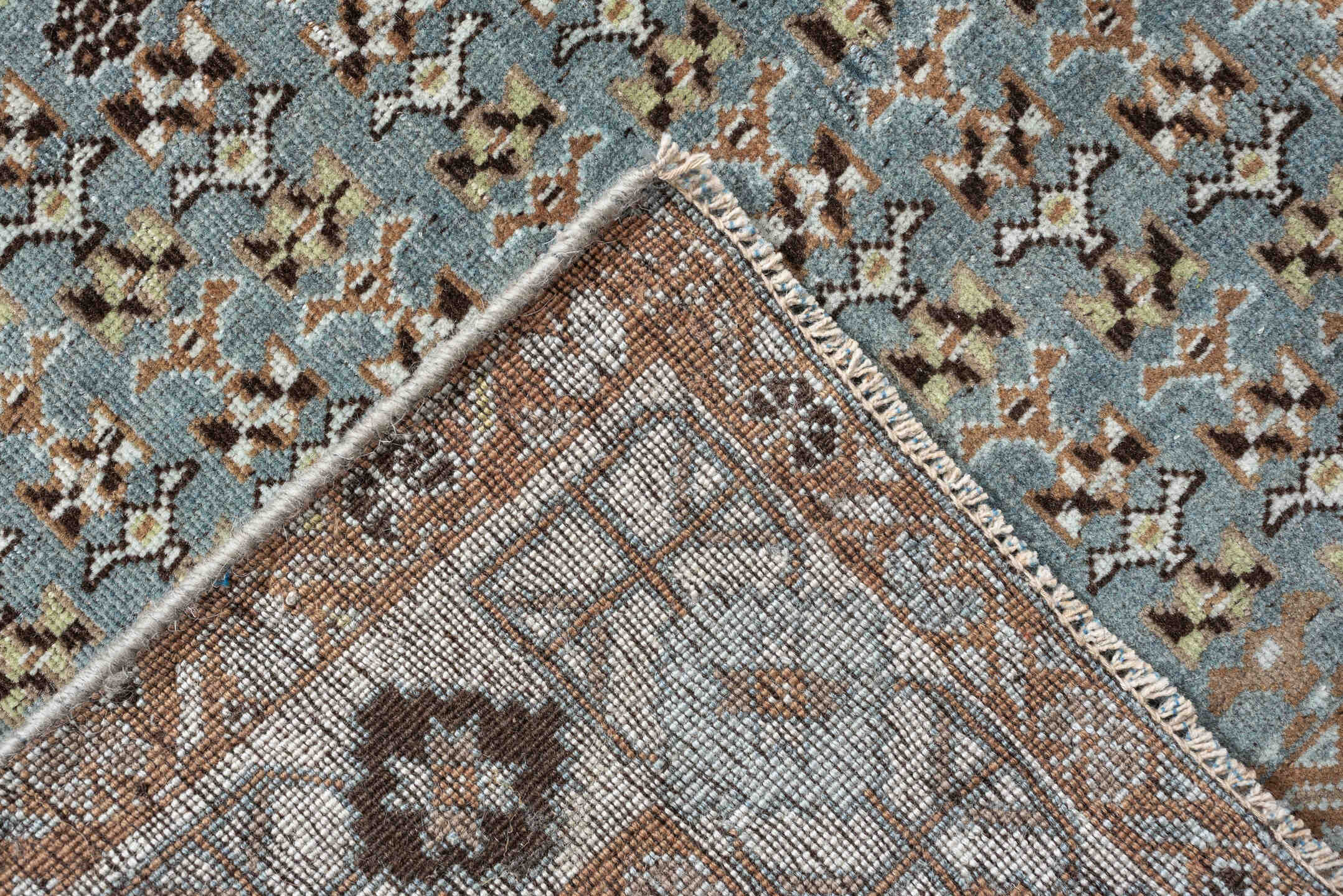 6' x 9' one-of-a-kind handmade antique Shiraz rug. Color palette: terra cotta, sky blue, ivory, camel, charcoal, sage, taupe