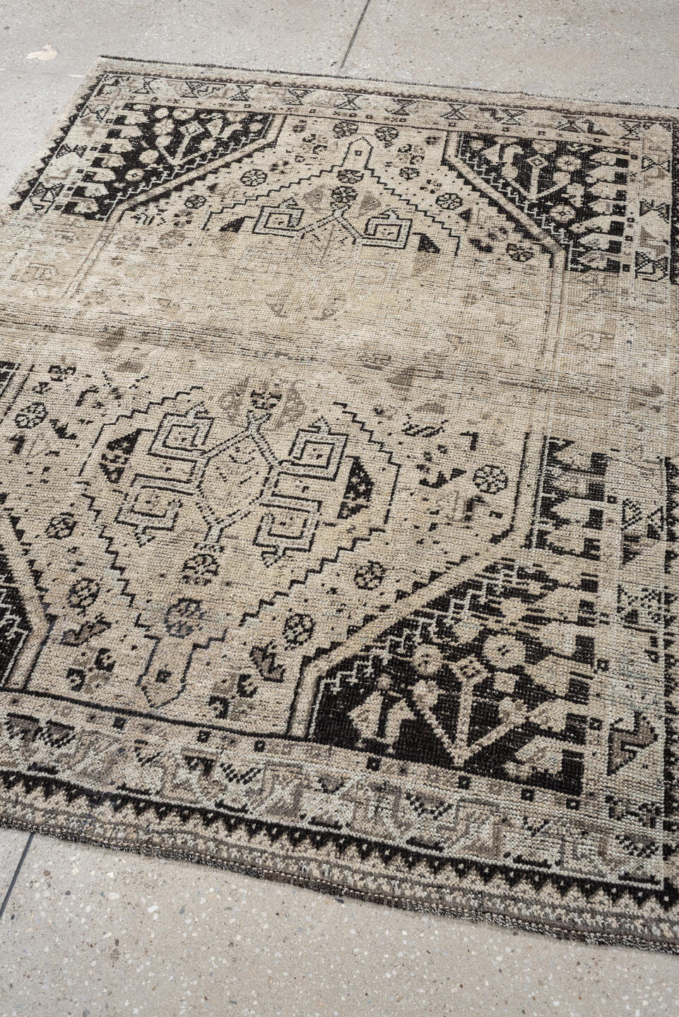 3' x 5' one-of-a-kind handmade antique Shiraz small size rug. Color palette: ivory, charcoal, taupe, gray, cream, black