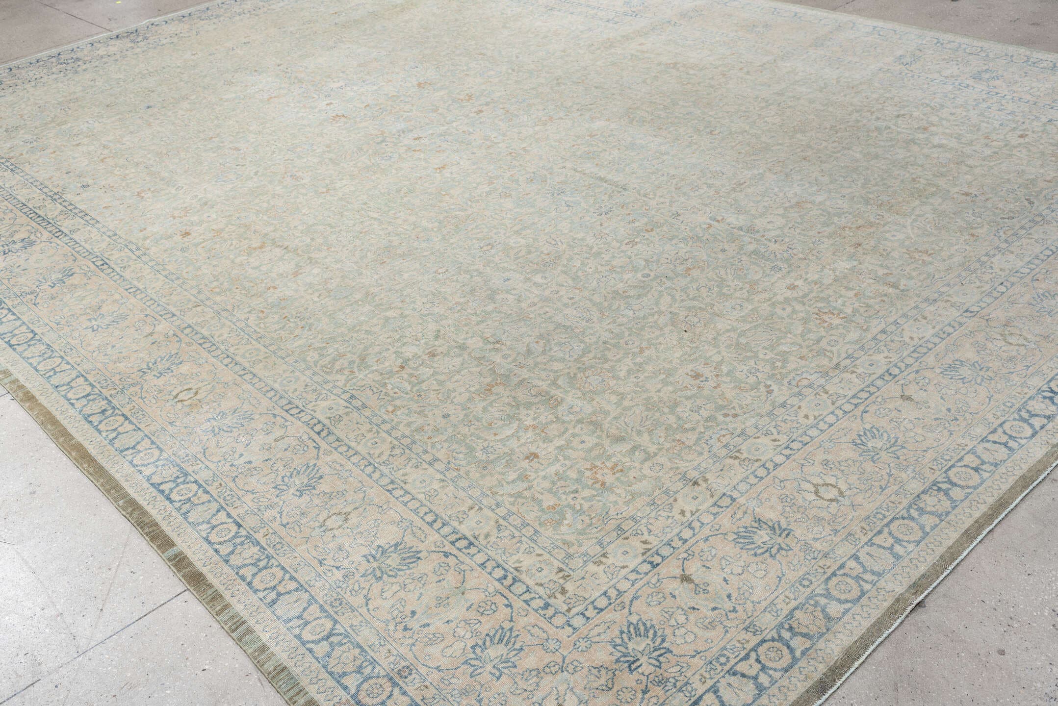 11' x 15' one-of-a-kind handmade antique Tabriz oversize rug. Color palette: ivory, pale blue, sky blue, cream, taupe