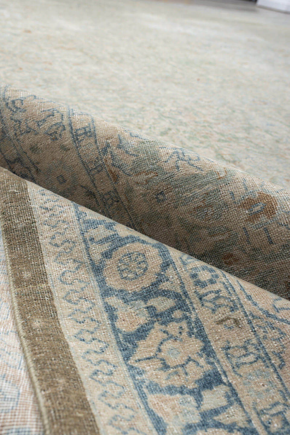 11' x 15' one-of-a-kind handmade antique Tabriz oversize rug. Color palette: ivory, pale blue, sky blue, cream, taupe