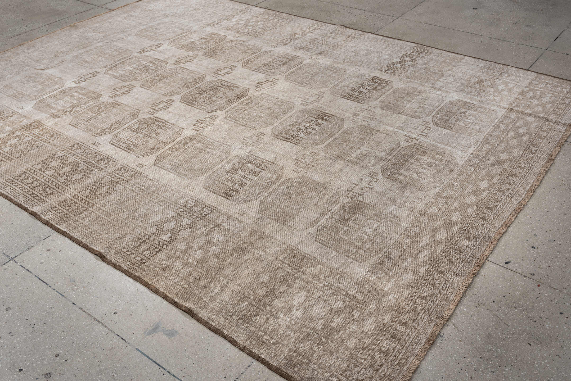 7' x 10' one-of-a-kind handmade antique Afghan large size rug. Color palette: taupe, beige, camel, ivory, brown, gray