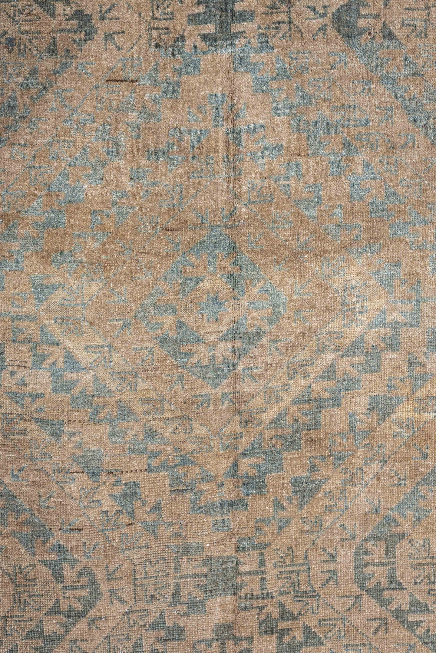 6' x 9' one-of-a-kind handmade antique Belouch large size rug. Color palette: camel, taupe, slate, pale blue, beige, brown