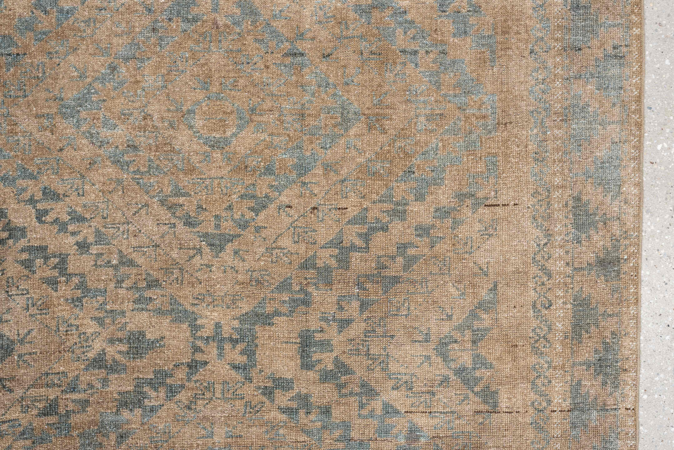 6' x 9' one-of-a-kind handmade antique Belouch large size rug. Color palette: camel, taupe, slate, pale blue, beige, brown