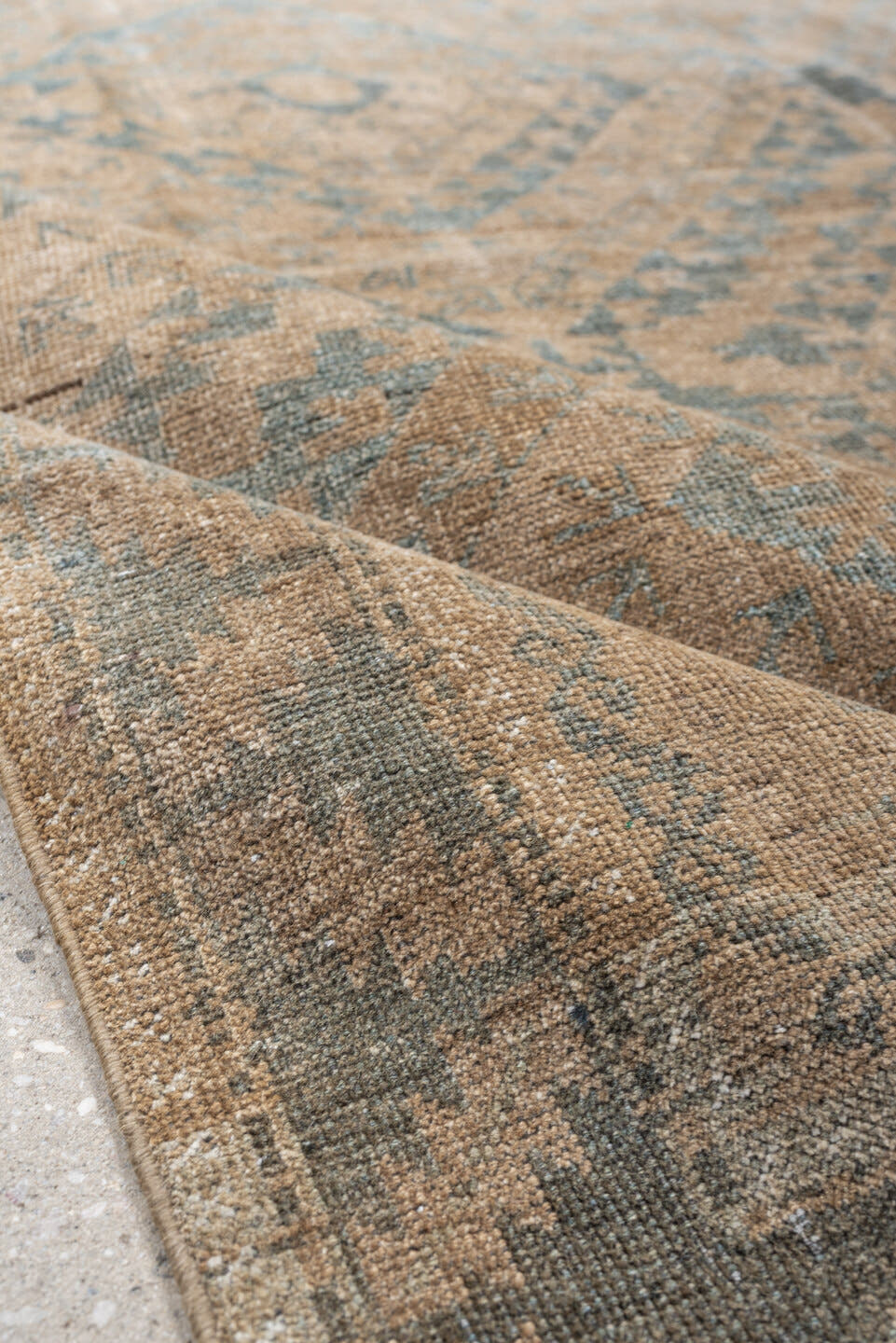 6' x 9' one-of-a-kind handmade antique Belouch large size rug. Color palette: camel, taupe, slate, pale blue, beige, brown