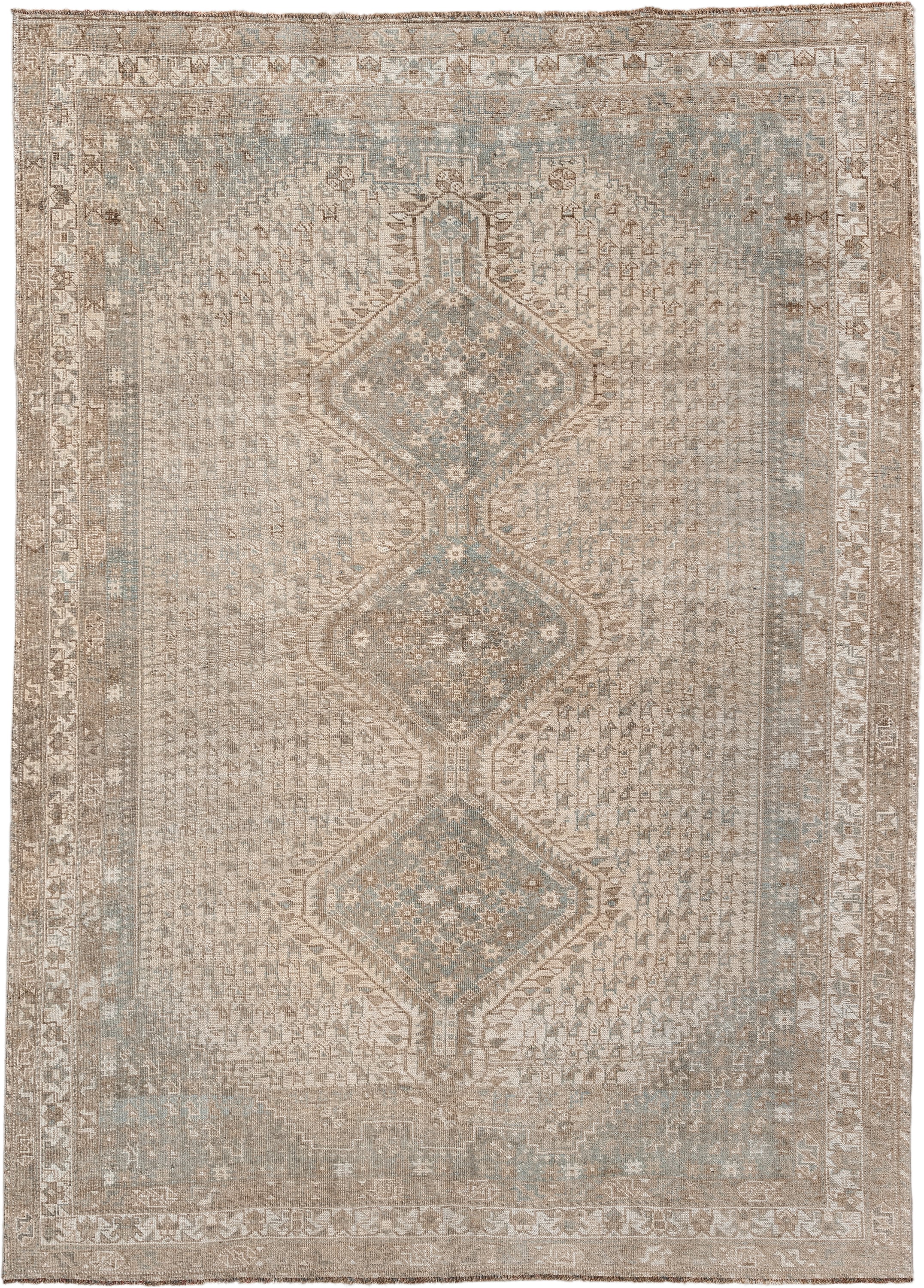 6' x 9' one-of-a-kind handmade antique Shiraz rug. Color palette: taupe, ivory, pale blue, beige, sand, camel, gray