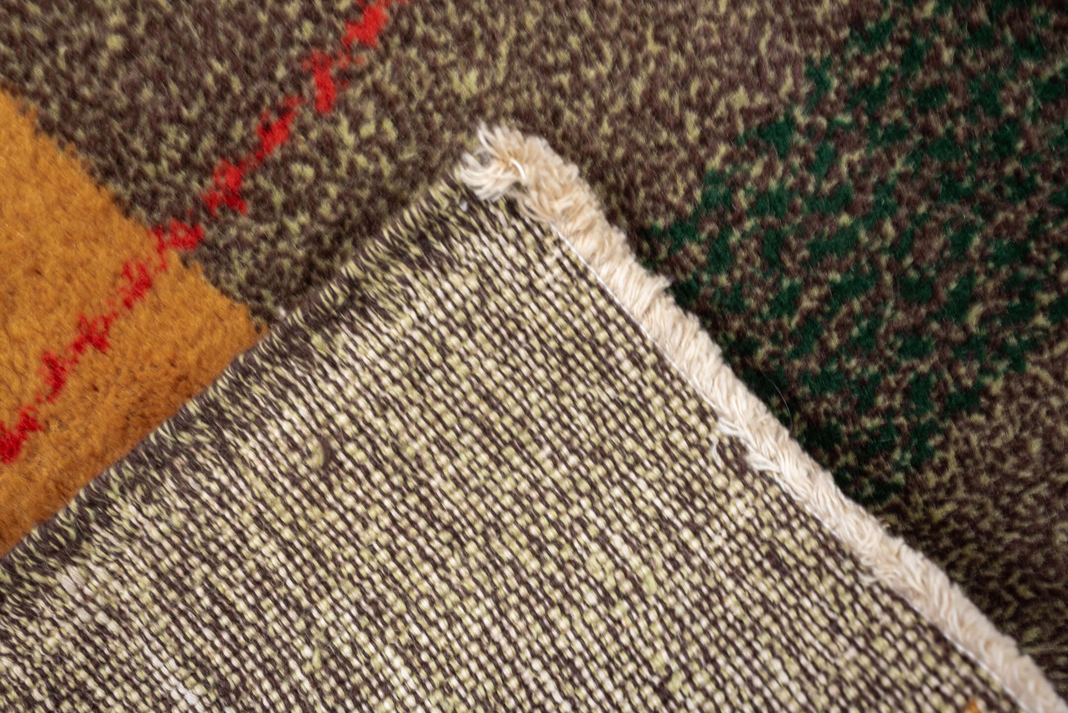 7' x 8' one-of-a-kind handmade antique Zeki Muran rug. Color palette: taupe, brown, camel, rust, red, forest_green, beige