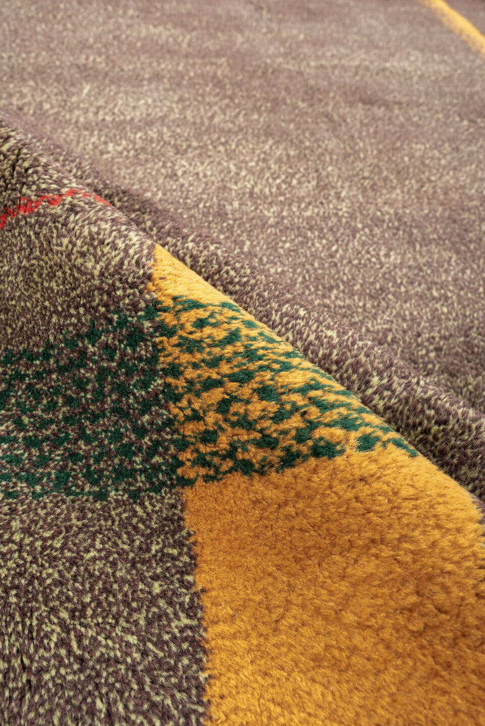 7' x 8' one-of-a-kind handmade antique Zeki Muran rug. Color palette: taupe, brown, camel, rust, red, forest_green, beige
