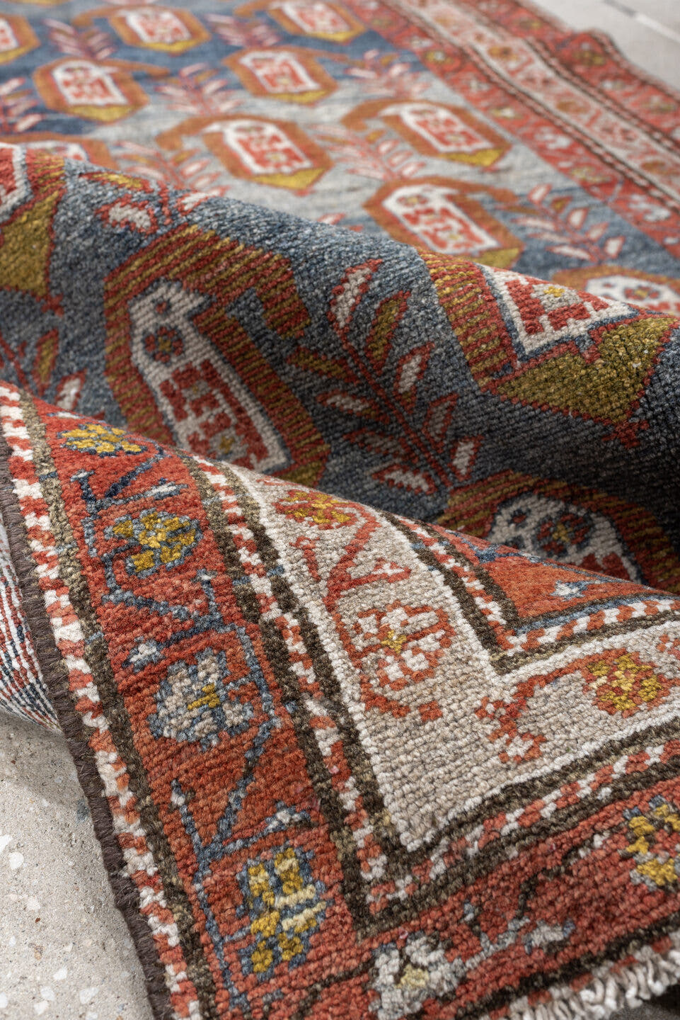 3' x 8' one-of-a-kind handmade antique Malayer runner rug. Color palette: blue, rust, ivory, rose, olive, terra cotta, brown