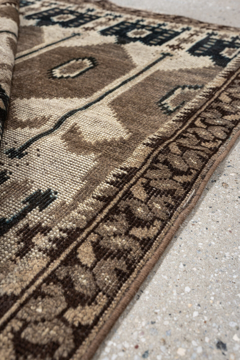 2' x 3' one-of-a-kind handmade antique Belouch small size rug. Color palette: camel, ivory, brown, indigo, taupe, beige