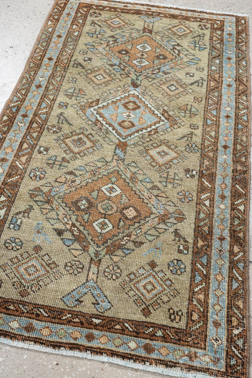 2' x 4' one-of-a-kind handmade antique Karaje small size rug. Color palette: ivory, sky_blue, brown, camel, taupe, slate