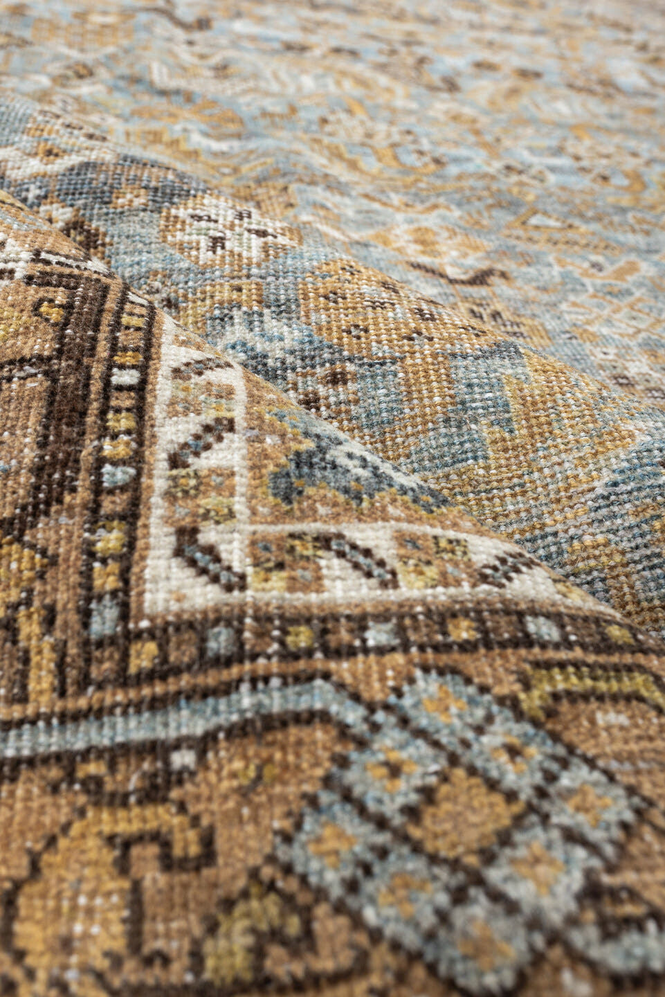 4' x 6' one-of-a-kind handmade antique Shiraz rug. Color palette: sky blue, camel, ivory, taupe, brown, slate, gold
