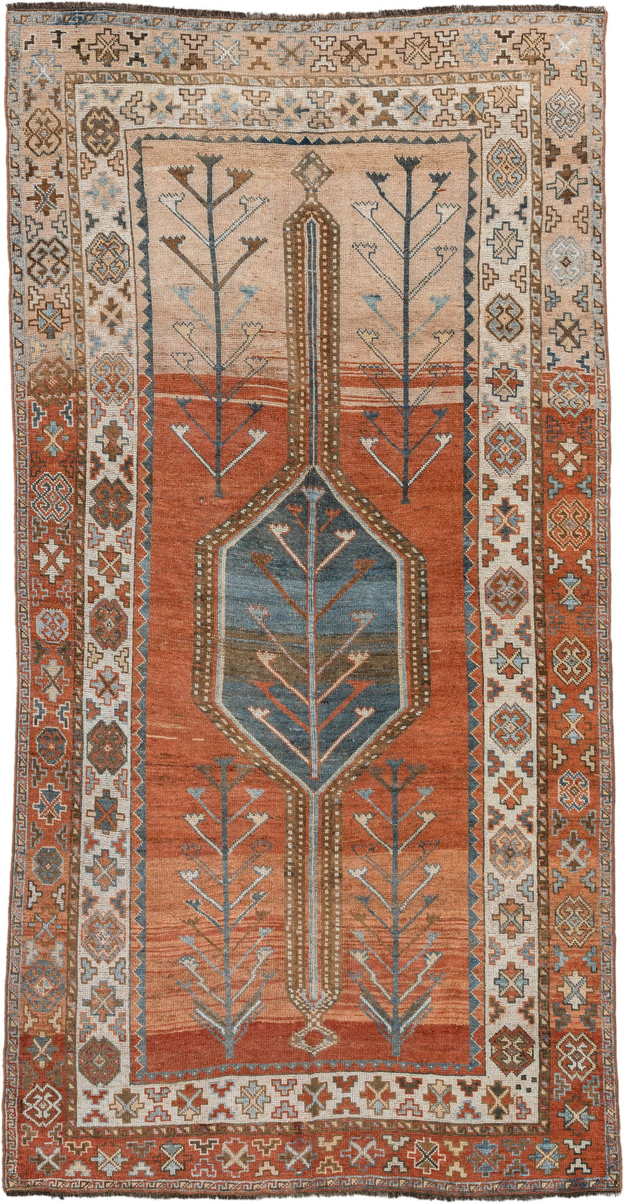 5' x 9' one-of-a-kind handmade antique Kurd medium size rug. Color palette: terra cotta, ivory, sky blue, brown, slate, rust
