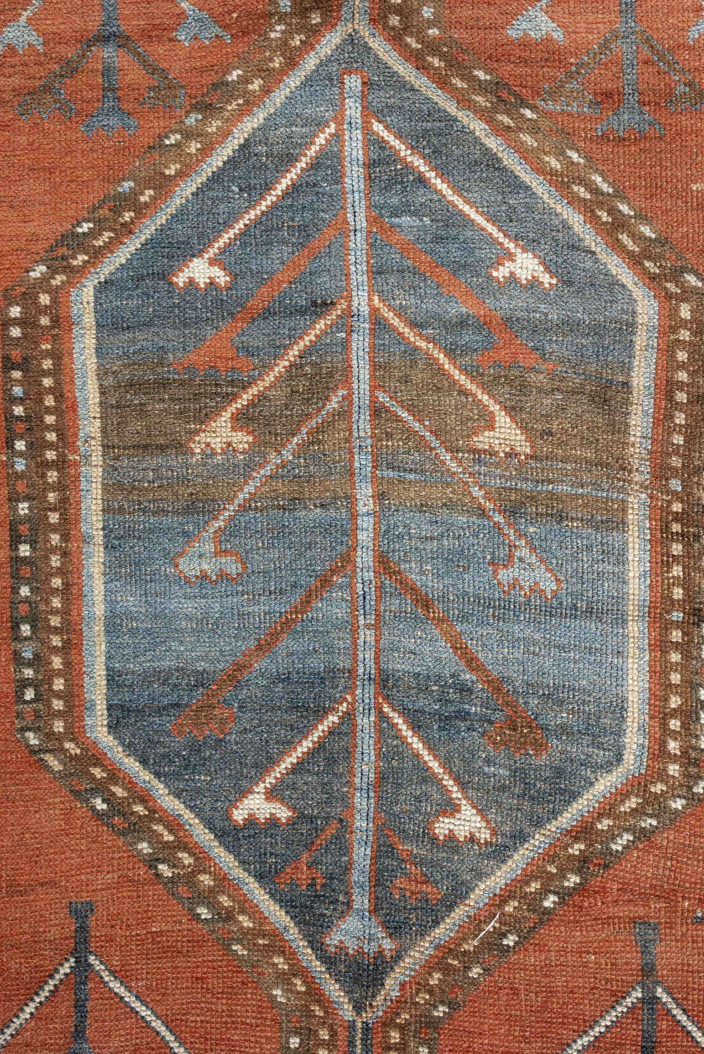 5' x 9' one-of-a-kind handmade antique Kurd medium size rug. Color palette: terra cotta, ivory, sky blue, brown, slate, rust