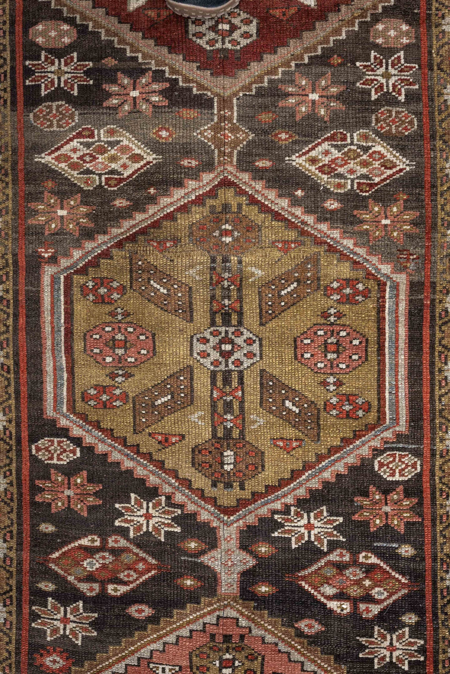 3' x 12' one-of-a-kind handmade antique Kurd runner rug. Color palette: brown, ivory, rust, camel, taupe, burgundy, olive