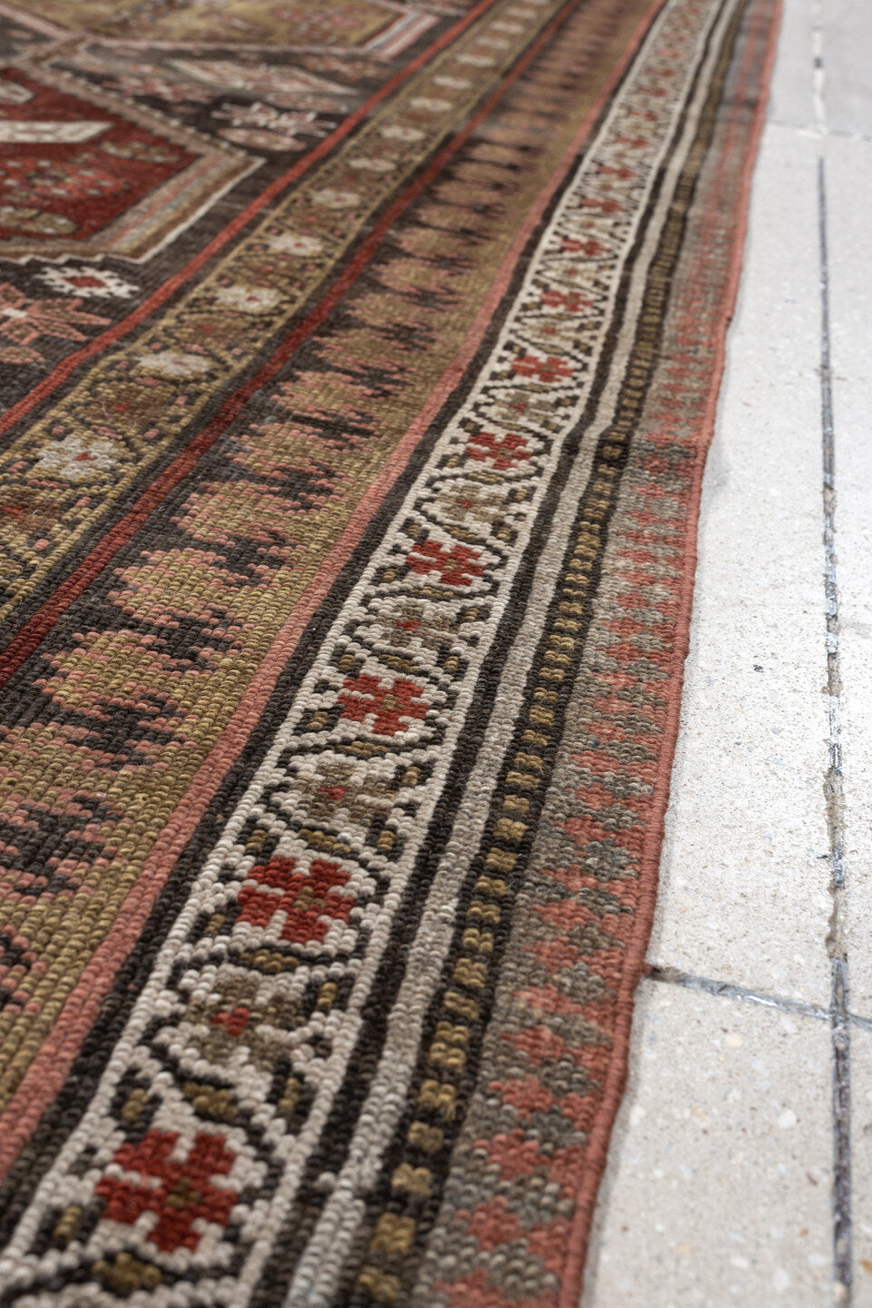 3' x 12' one-of-a-kind handmade antique Kurd runner rug. Color palette: brown, ivory, rust, camel, taupe, burgundy, olive