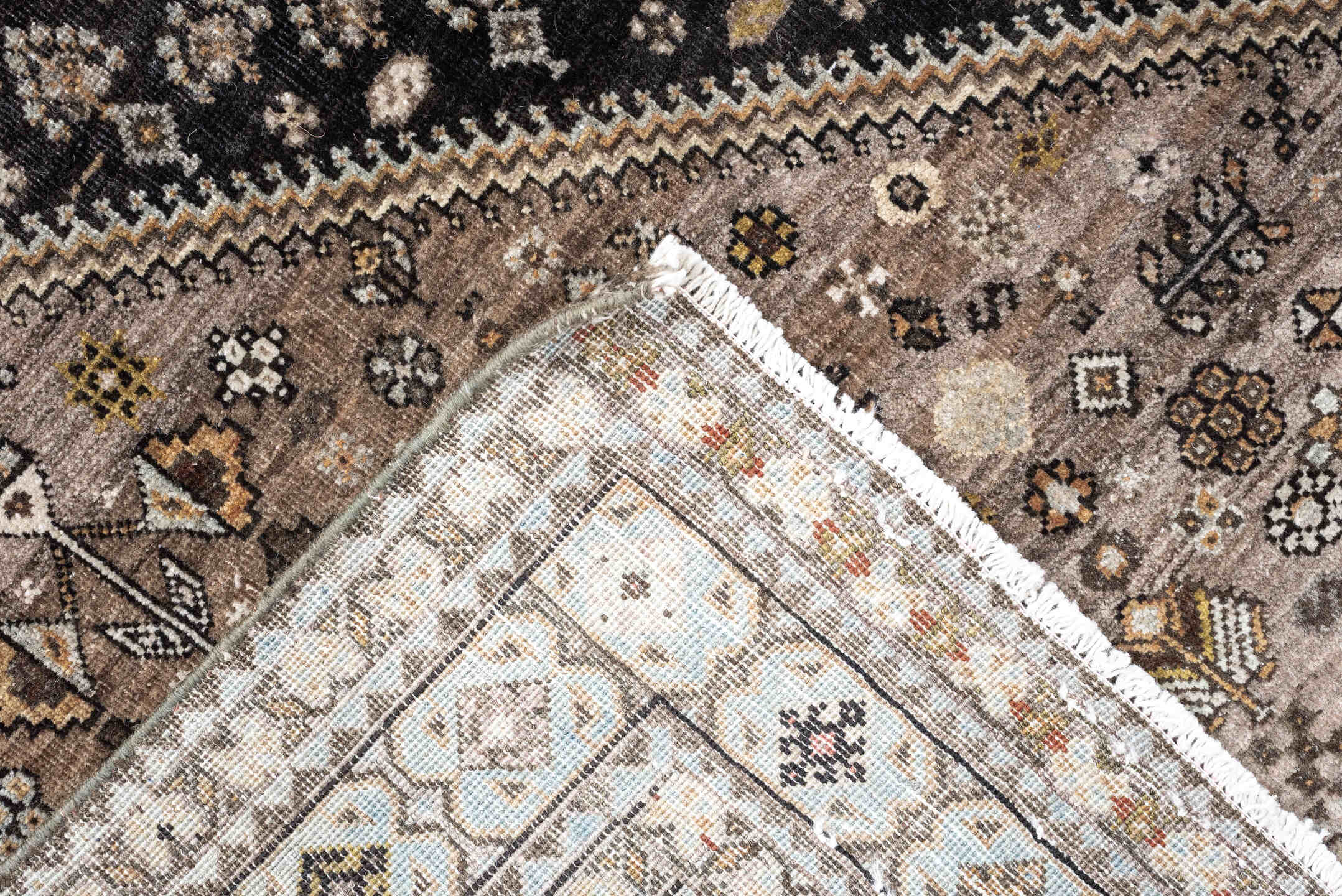 5' x 6' one-of-a-kind handmade antique Afshar rug. Color palette: charcoal, ivory, taupe, rust, pale blue, brown, camel