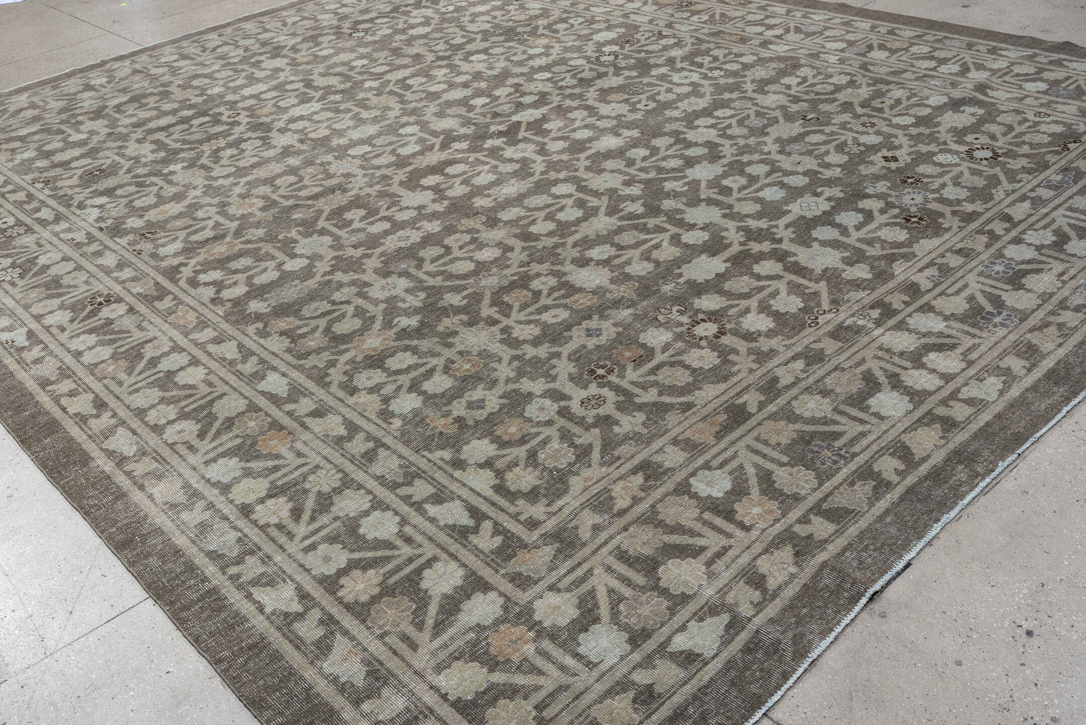 12' x 14' one-of-a-kind handmade vintage Khotan oversize rug. Color palette: taupe, ivory, beige, brown, camel, slate, gray