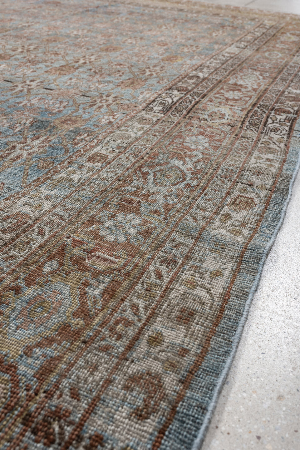 7' x 10' one-of-a-kind handmade antique Bidjar large size rug. Color palette: sky blue, ivory, terra cotta, taupe, camel