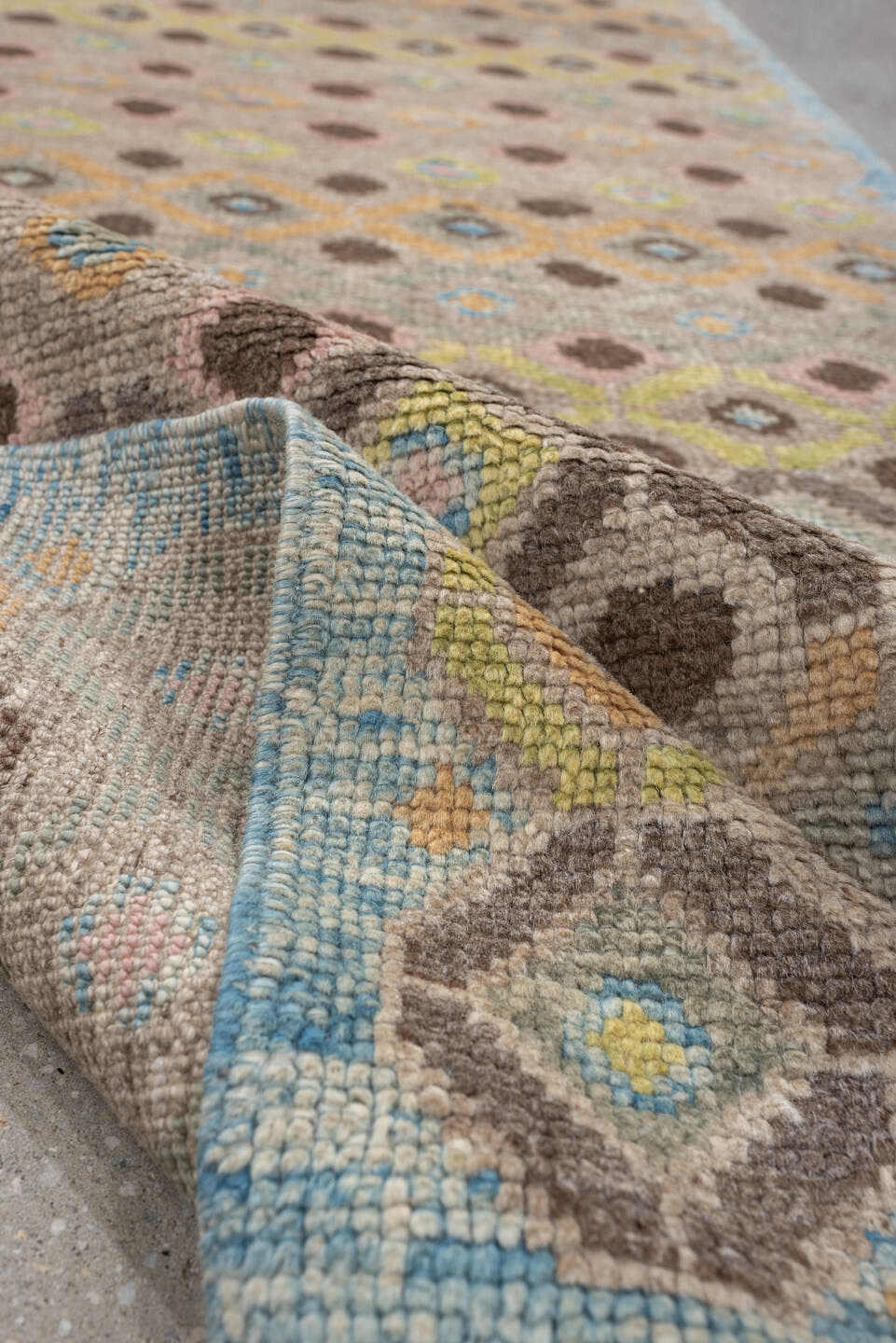 2' x 11' one-of-a-kind handmade vintage Oushak runner rug. Color palette: taupe, sky blue, camel, brown, ivory, sage, gold