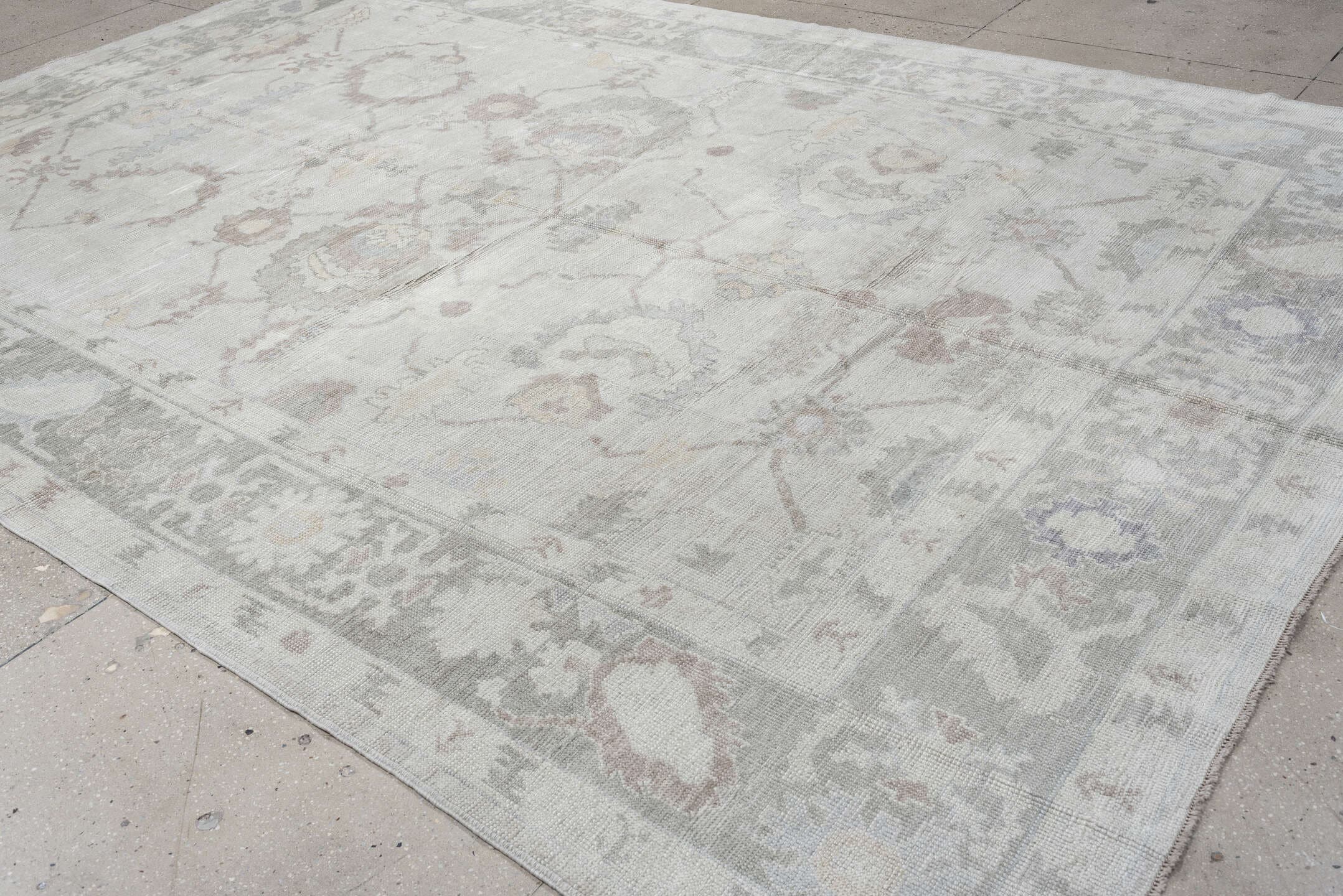 9' x 13' one-of-a-kind handmade vintage Oushak large size rug. Color palette: ivory, pale gray, blush, taupe, sage