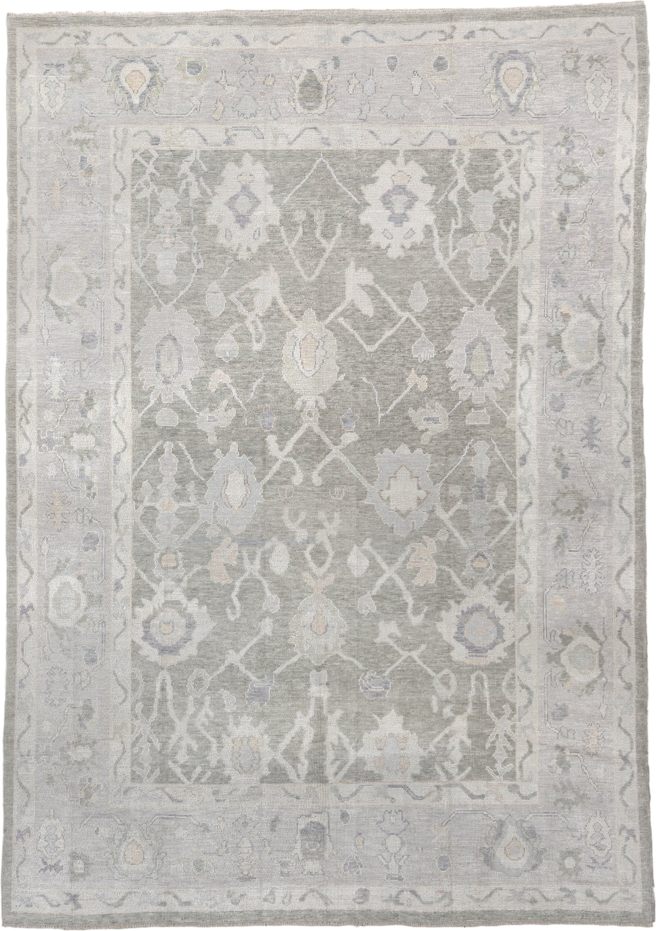 9' x 13' one-of-a-kind handmade vintage Oushak large size rug. Color palette: gray, ivory, taupe, pale blue, cream, beige
