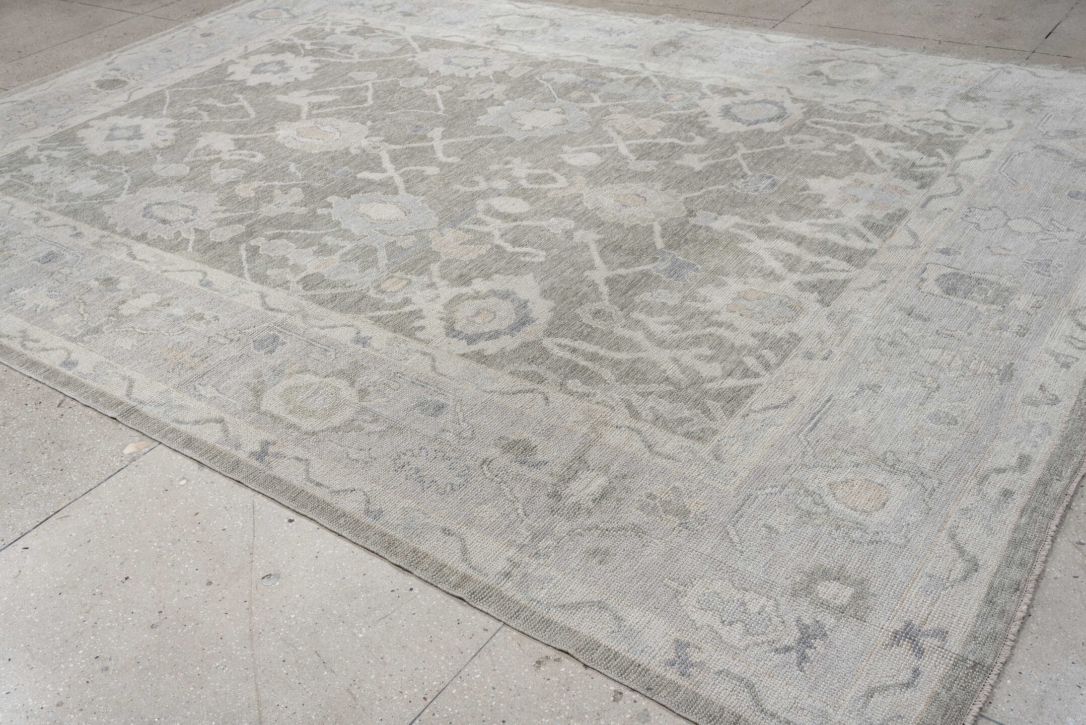 9' x 13' one-of-a-kind handmade vintage Oushak large size rug. Color palette: gray, ivory, taupe, pale blue, cream, beige