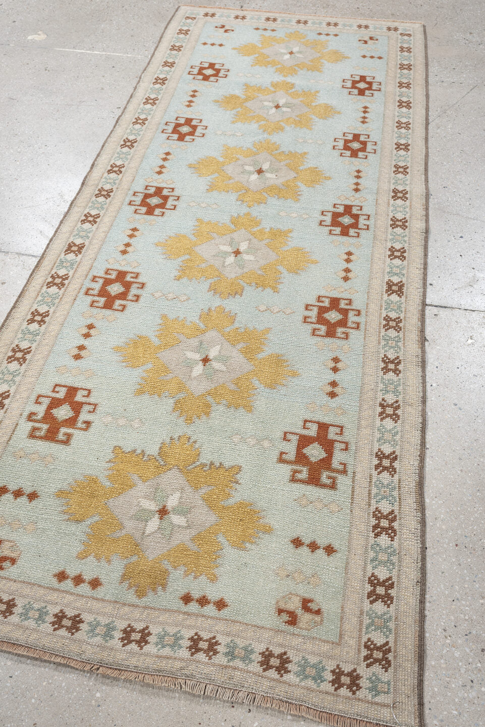 2' x 8' one-of-a-kind handmade vintage Oushak runner rug. Color palette: pale blue, ivory, gold, rust, taupe, sage
