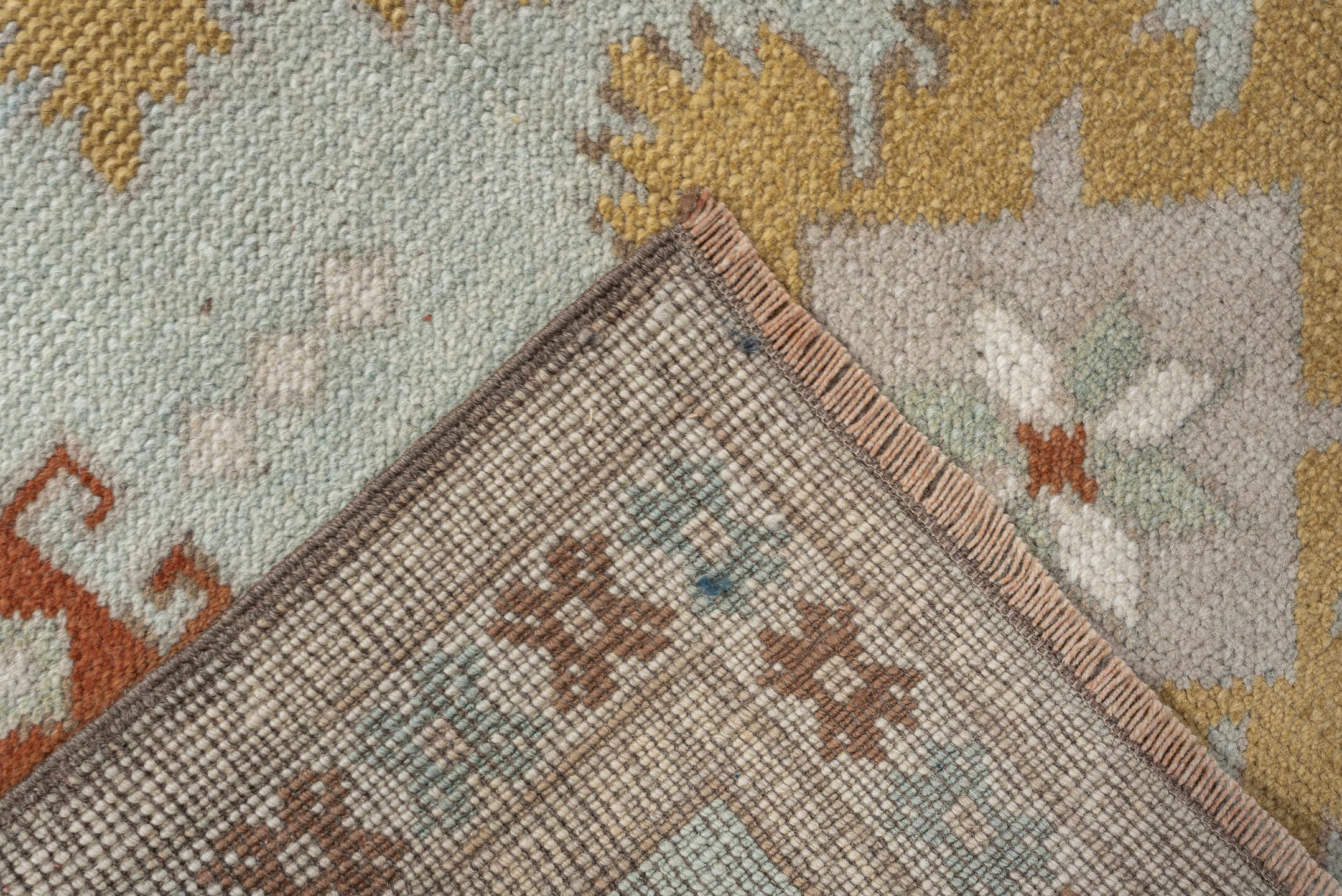 2' x 8' one-of-a-kind handmade vintage Oushak runner rug. Color palette: pale blue, ivory, gold, rust, taupe, sage