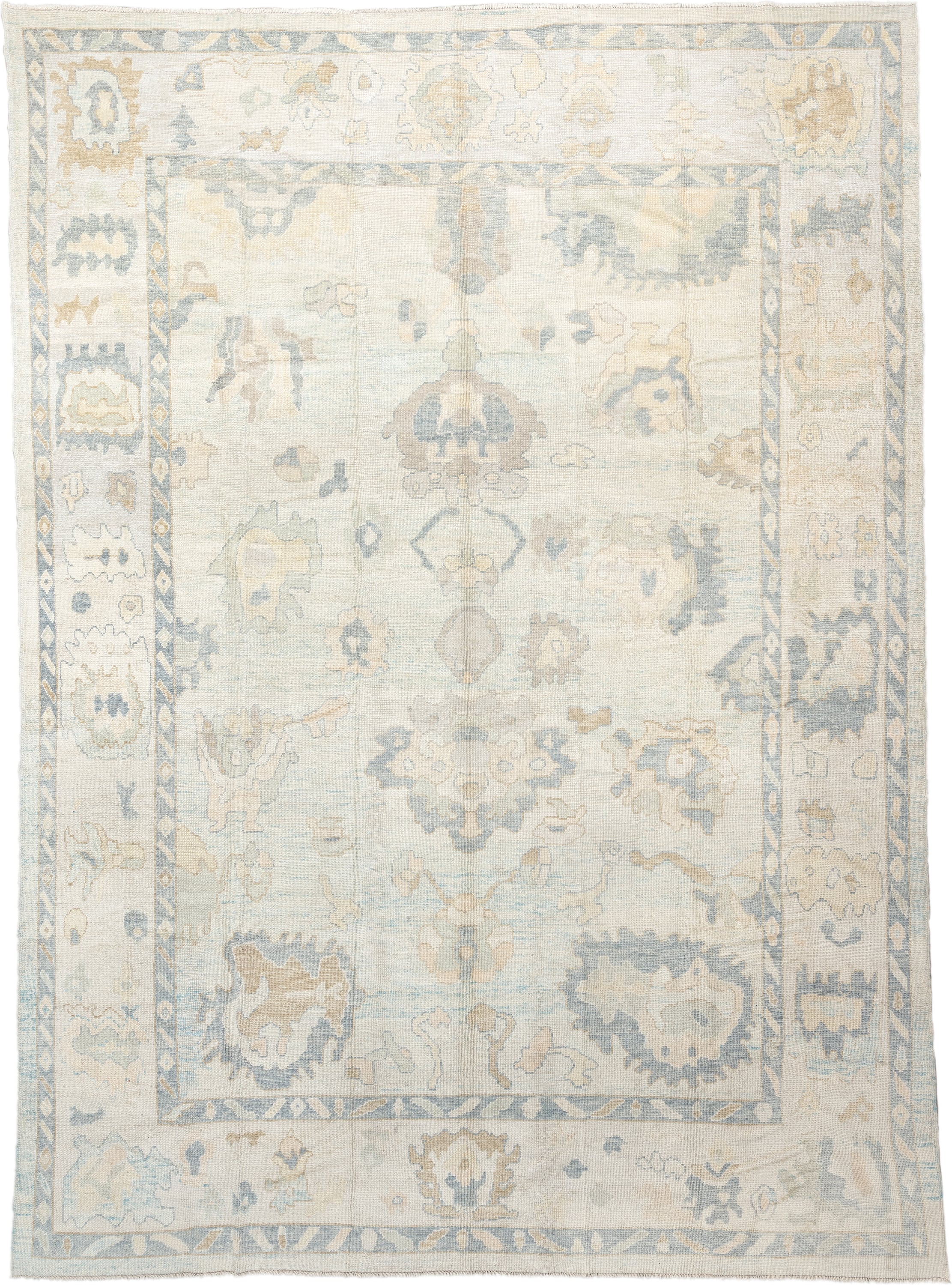 12' x 17' one-of-a-kind handmade vintage Oushak oversize rug. Color palette: ivory, pale blue, beige, taupe, cream, sage