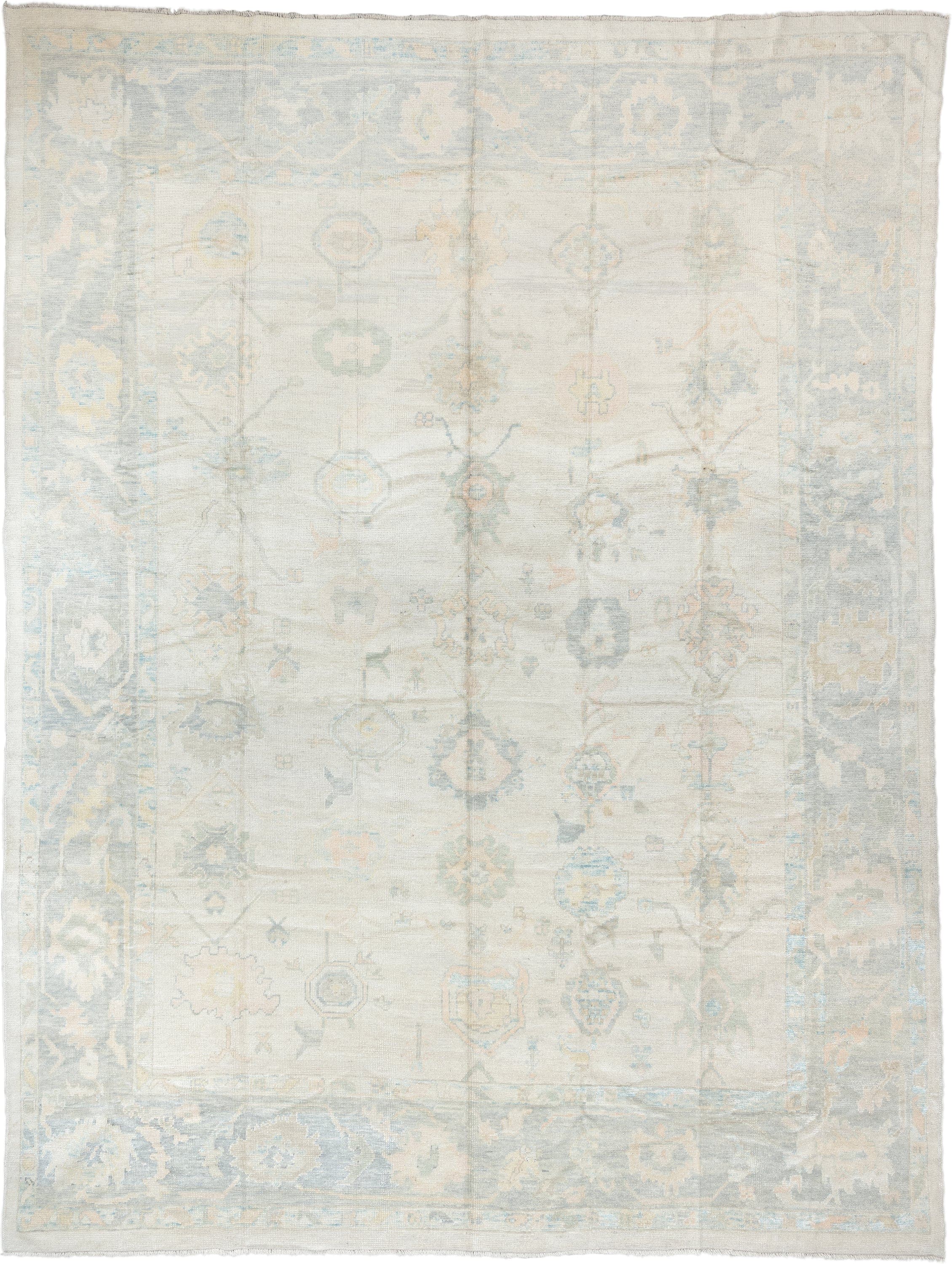 12' x 16' one-of-a-kind handmade vintage Oushak oversize rug. Color palette: ivory, pale blue, cream, taupe, blush, sage