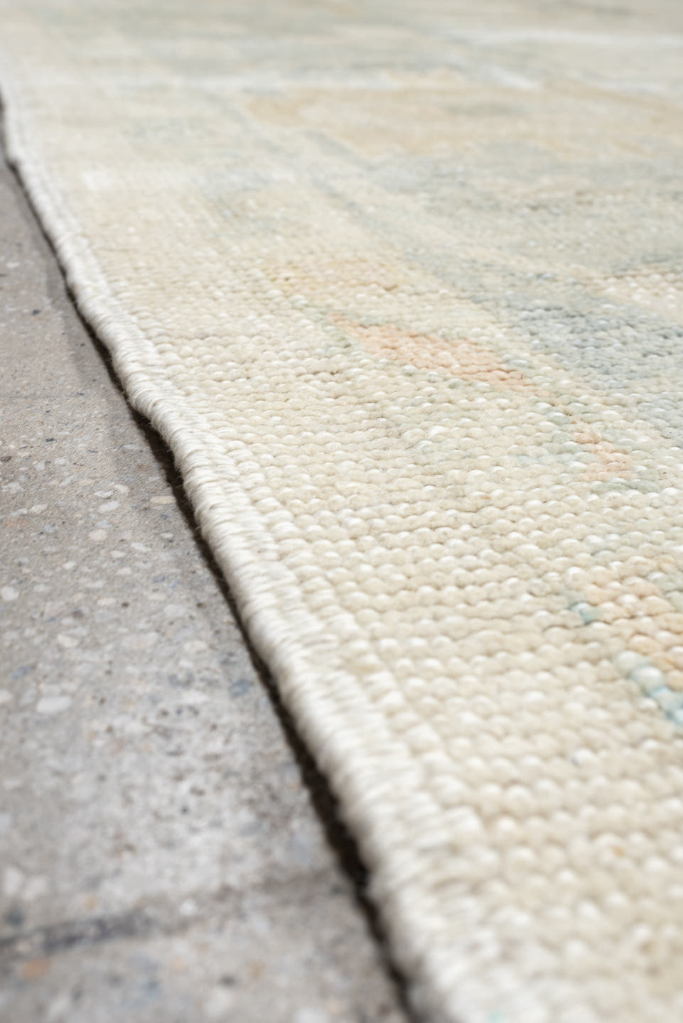 12' x 16' one-of-a-kind handmade vintage Oushak oversize rug. Color palette: ivory, pale blue, cream, taupe, blush, sage