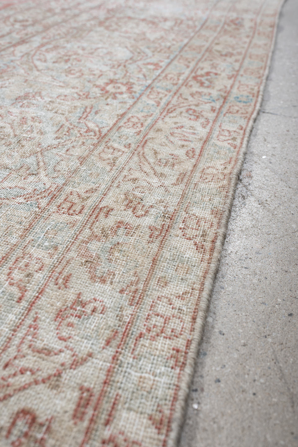 10' x 14' one-of-a-kind handmade antique Isfahan rug. Color palette: rose, ivory, pale blue, cream, taupe, blush, pink, red